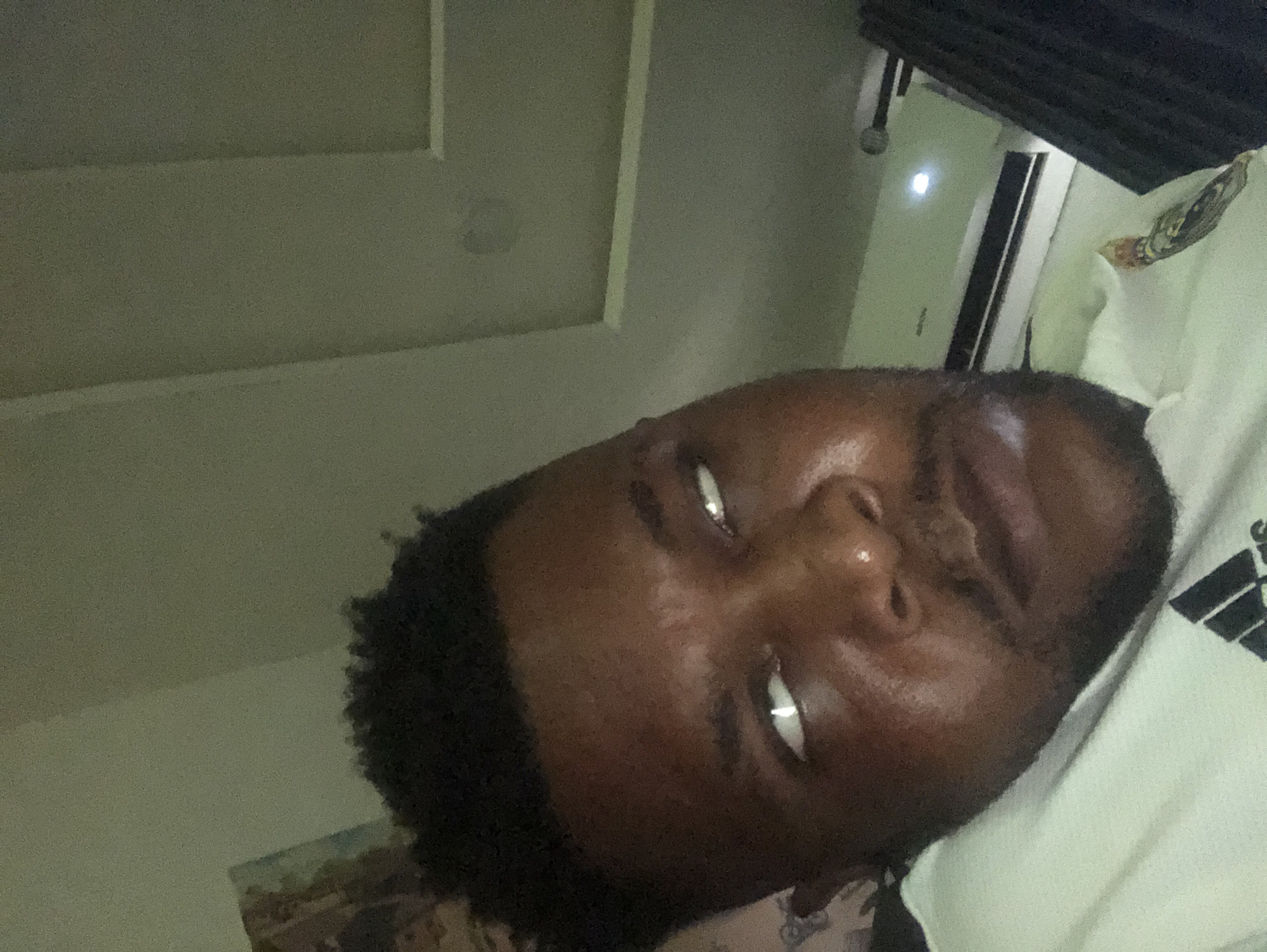 Man photographed repeatedly in outdoor selfie session near roadway