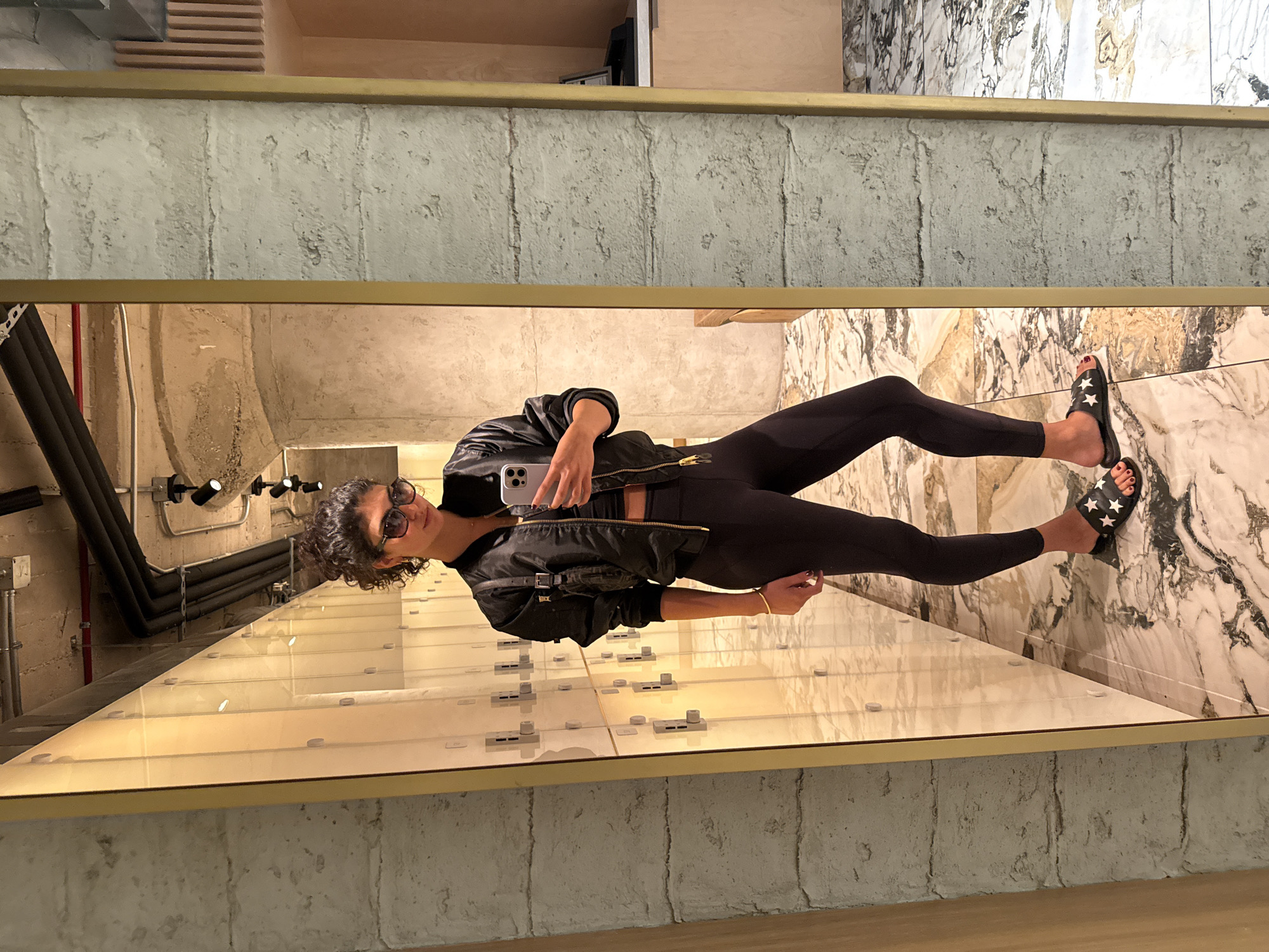 Woman takes mirror selfie in West Hollywood