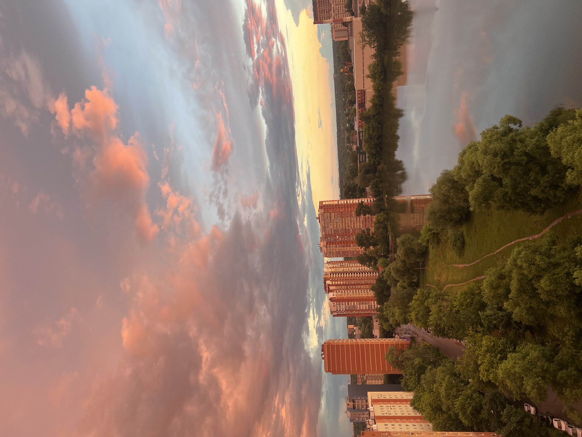 Pushkino at golden hour, wet streets and dramatic skies