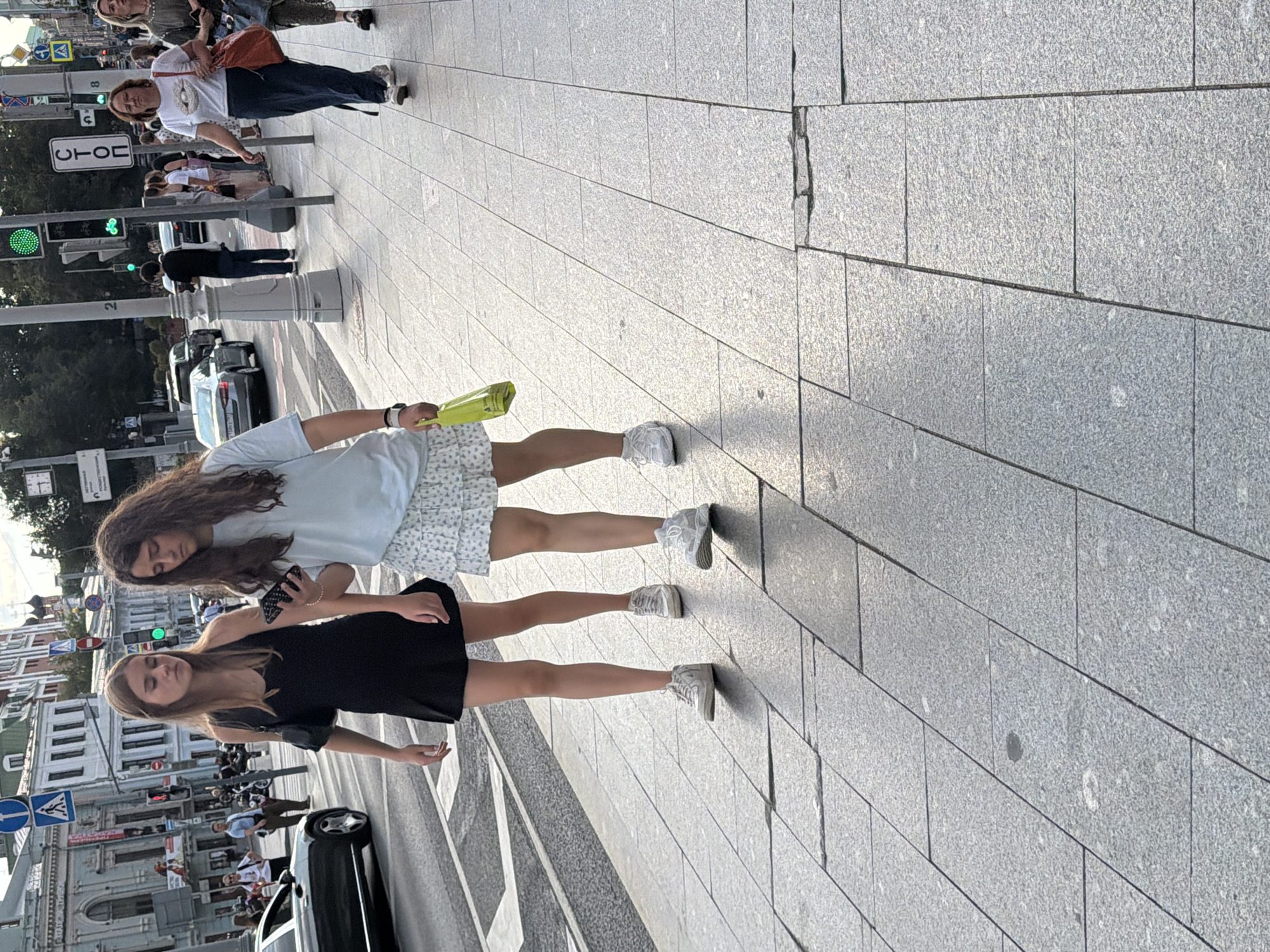 Street and subway life in a busy city on a summer afternoon