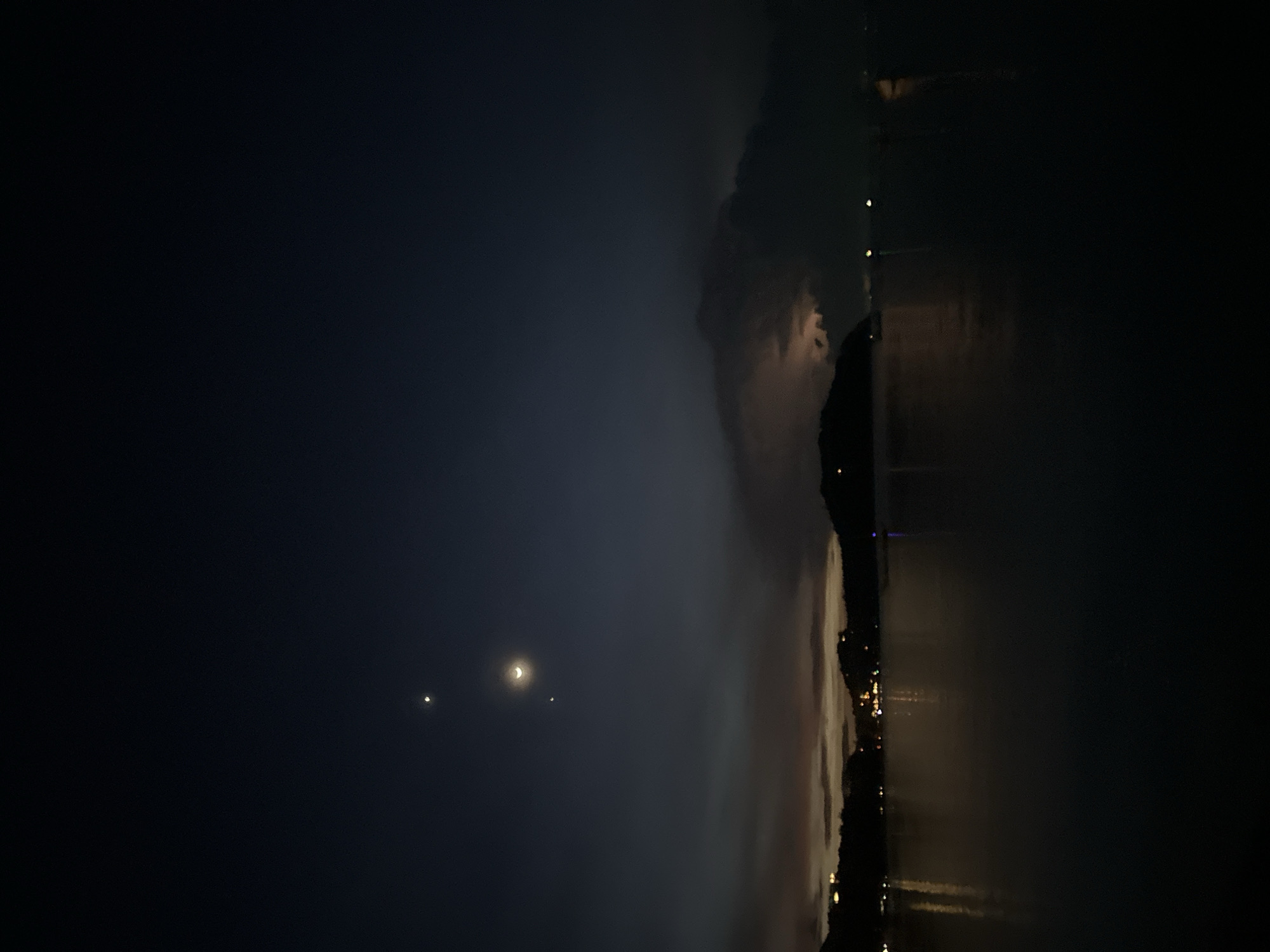 Twilight on Koh Phangan: bay, boats, and beach at dusk