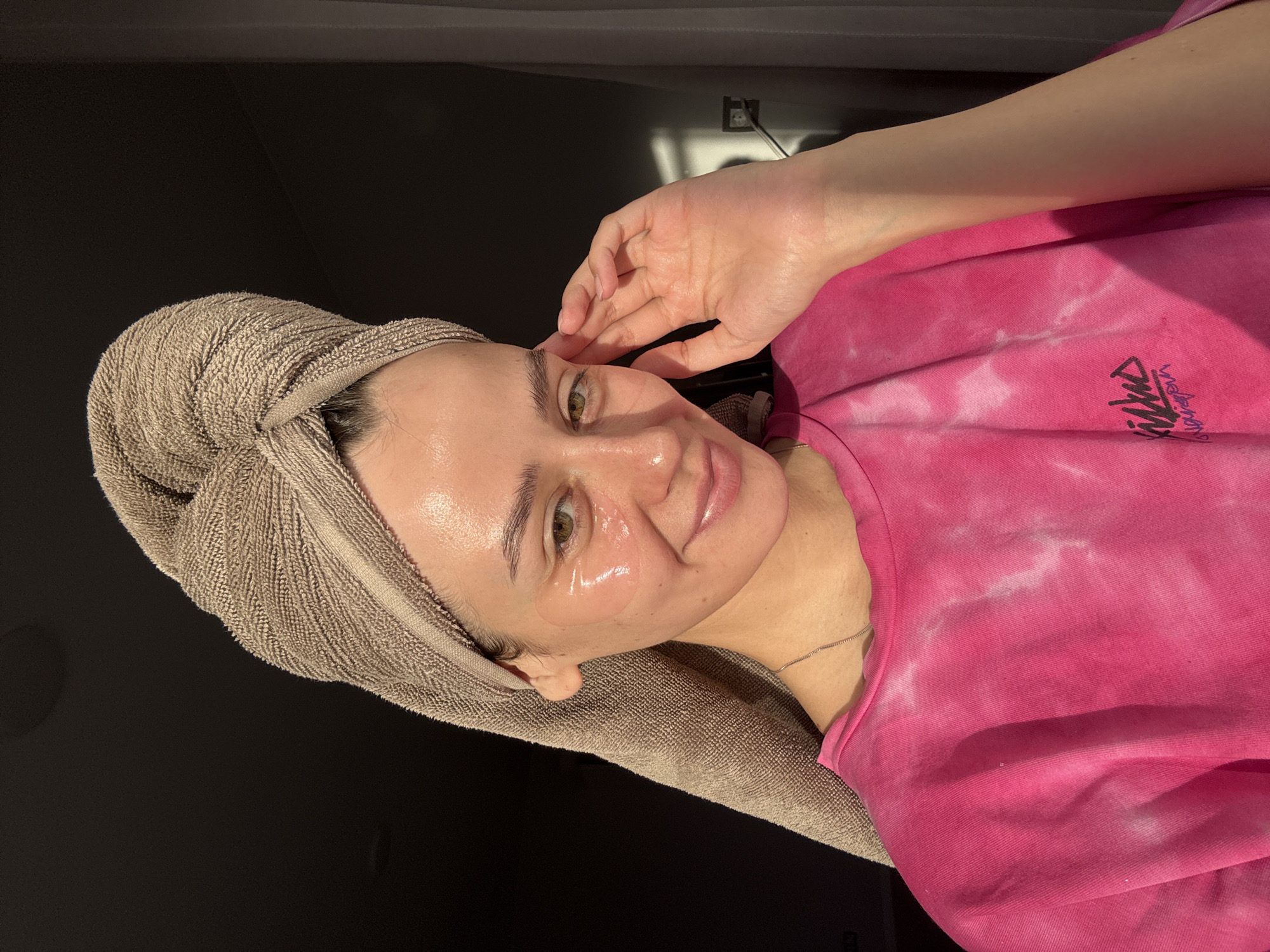Woman's morning routine with pet cockatiel companion in Krasnoyarsk