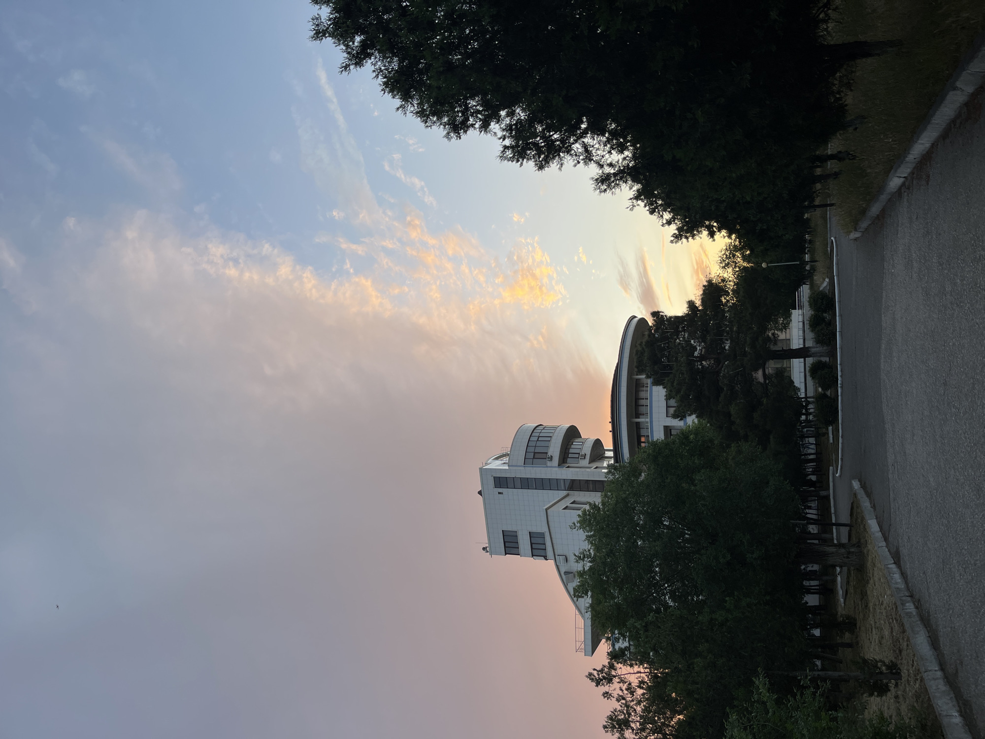 Sunset scenes documented in Kaspiysk, Russia street and buildings