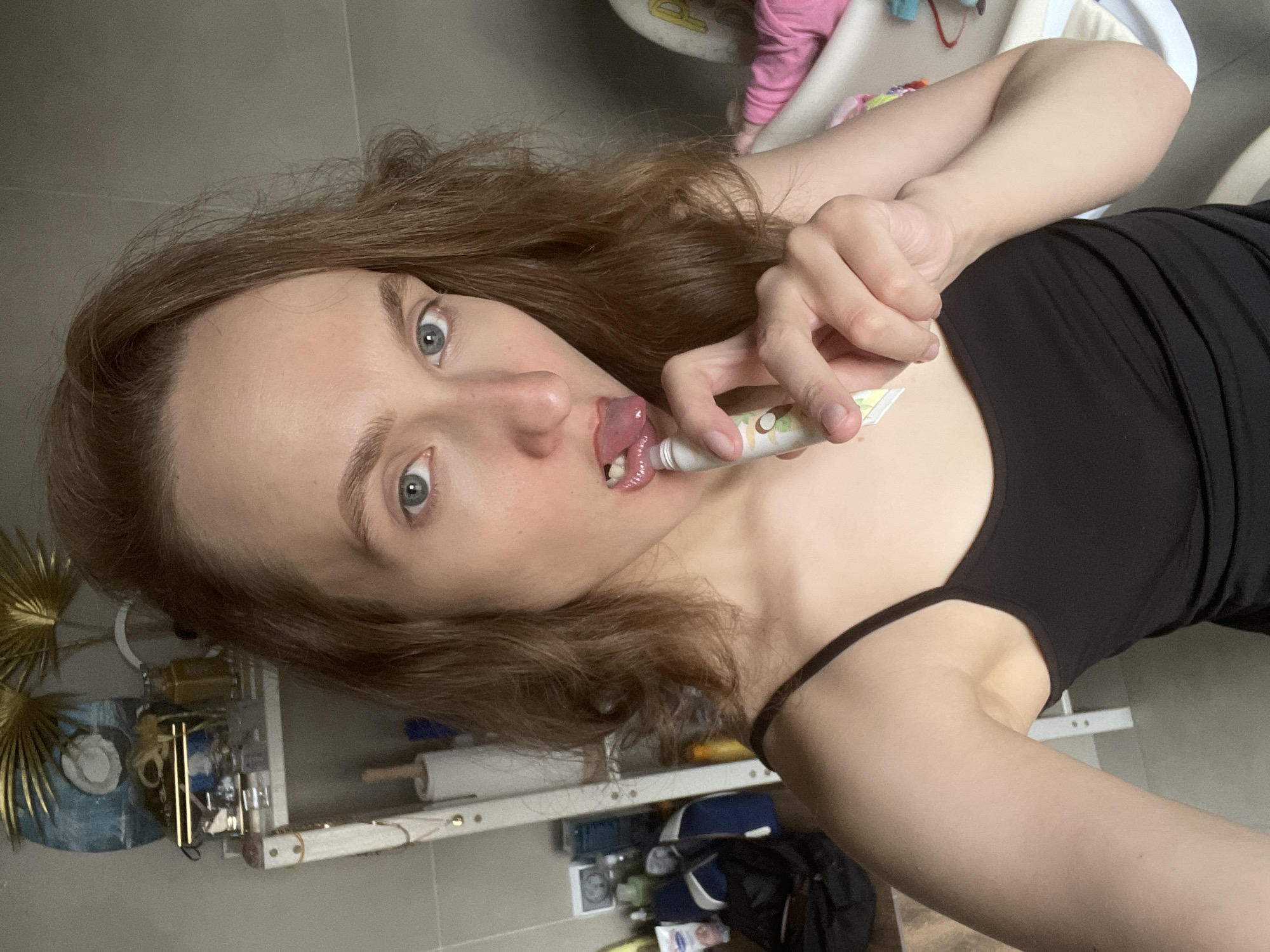 Woman takes mirror selfies in Podshivalovo, Russia