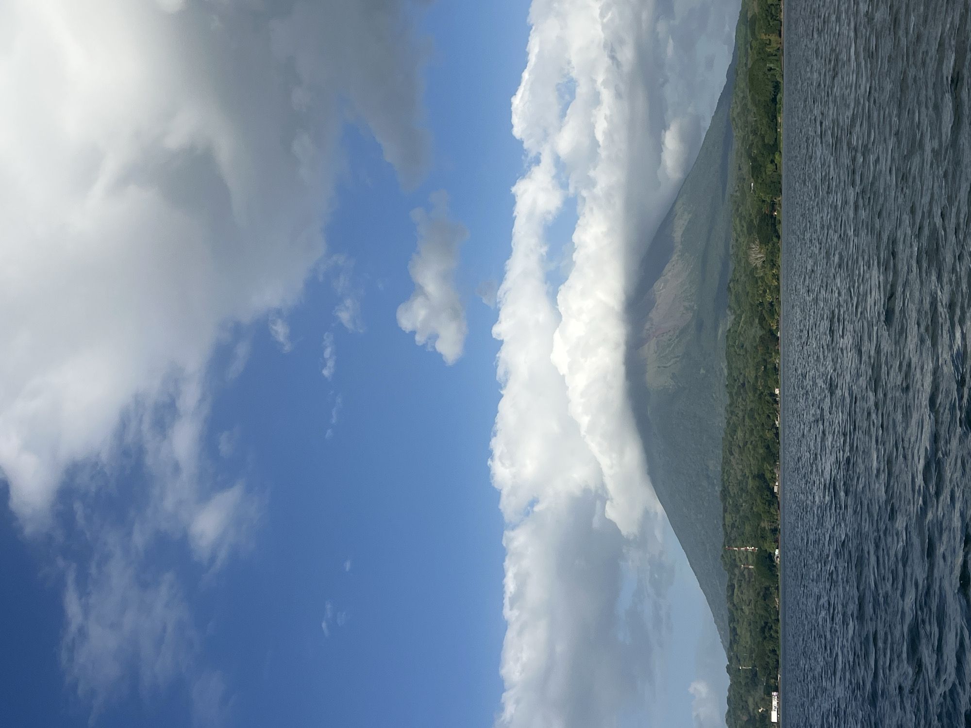 Cloud-draped volcano looms over Moyogalpa, Nicaragua