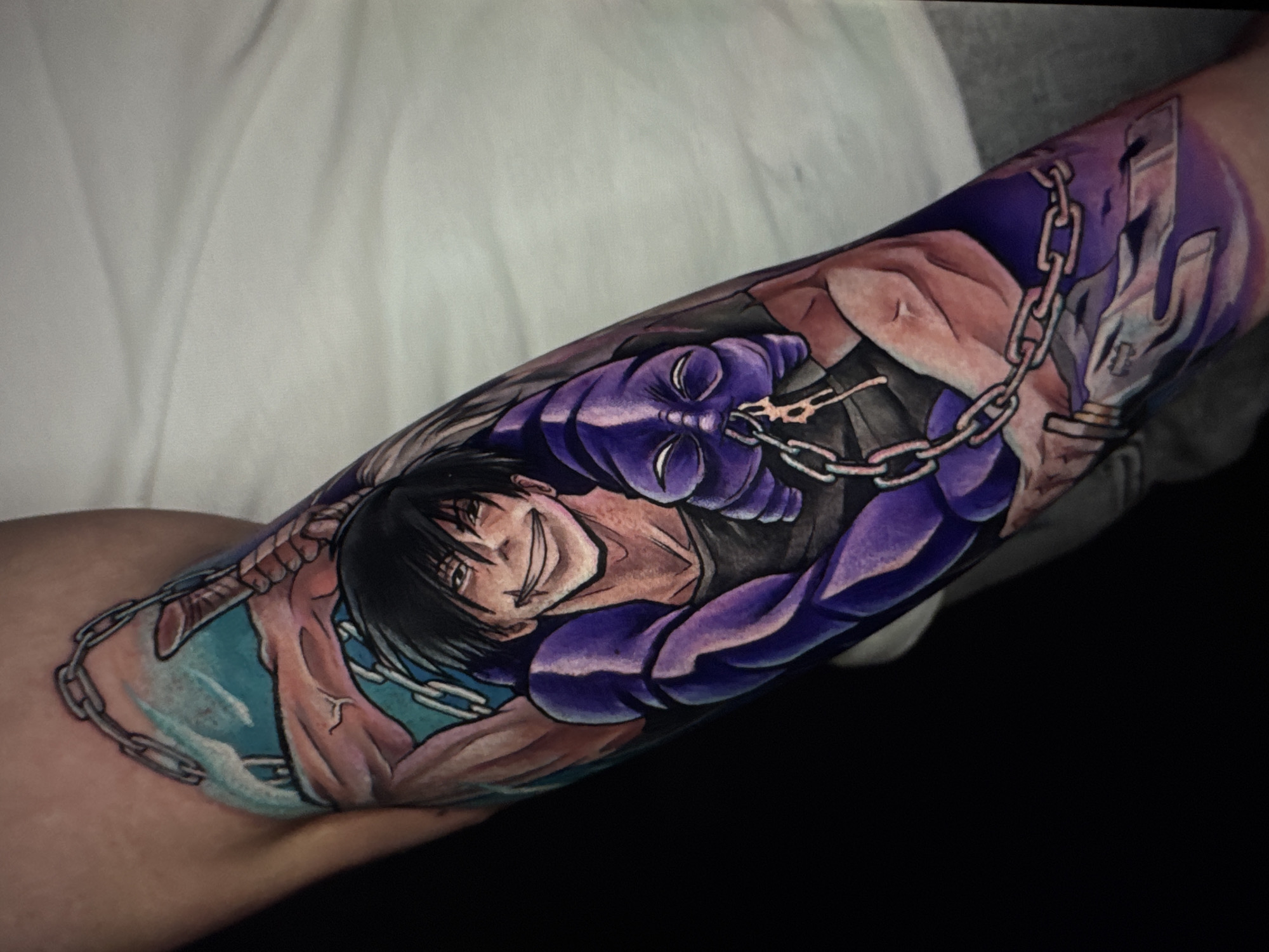Tattoo art and digital illustrations spanning anime, fantasy, and horror styles
