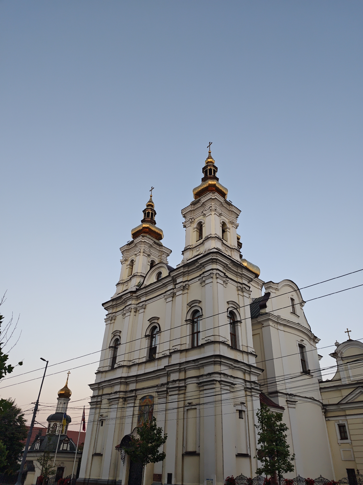 Street-level Vinnytsia: orthodox church meets quirky cat sculptures