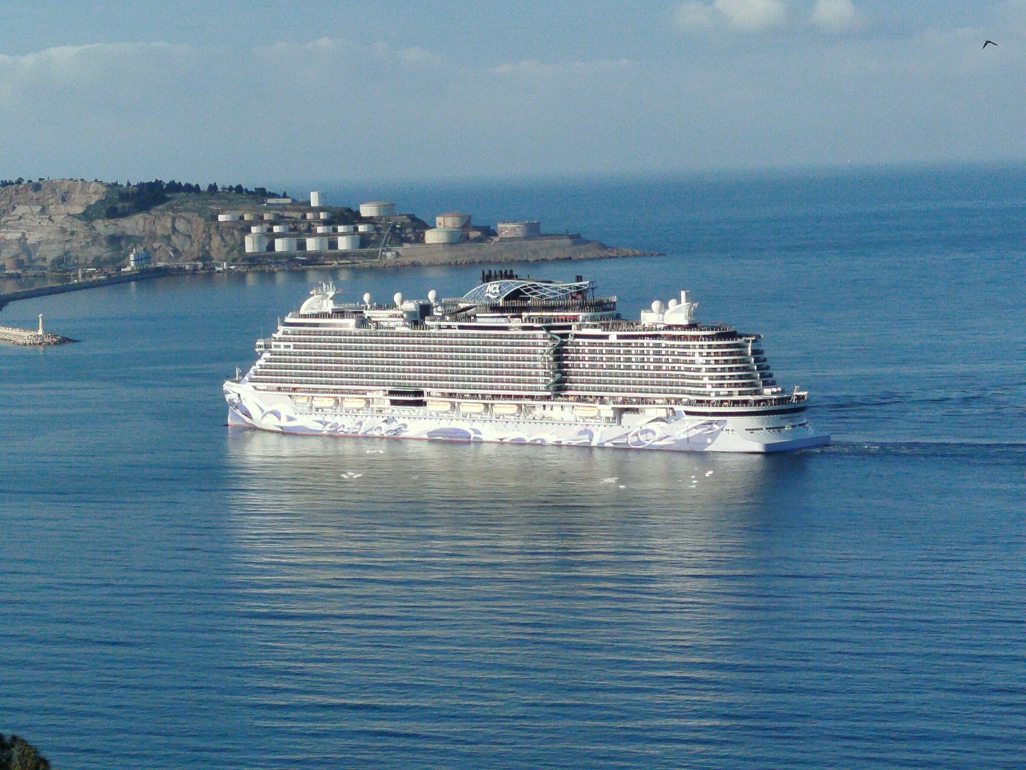 Cruise ship sails past Montenegro coast at dawn