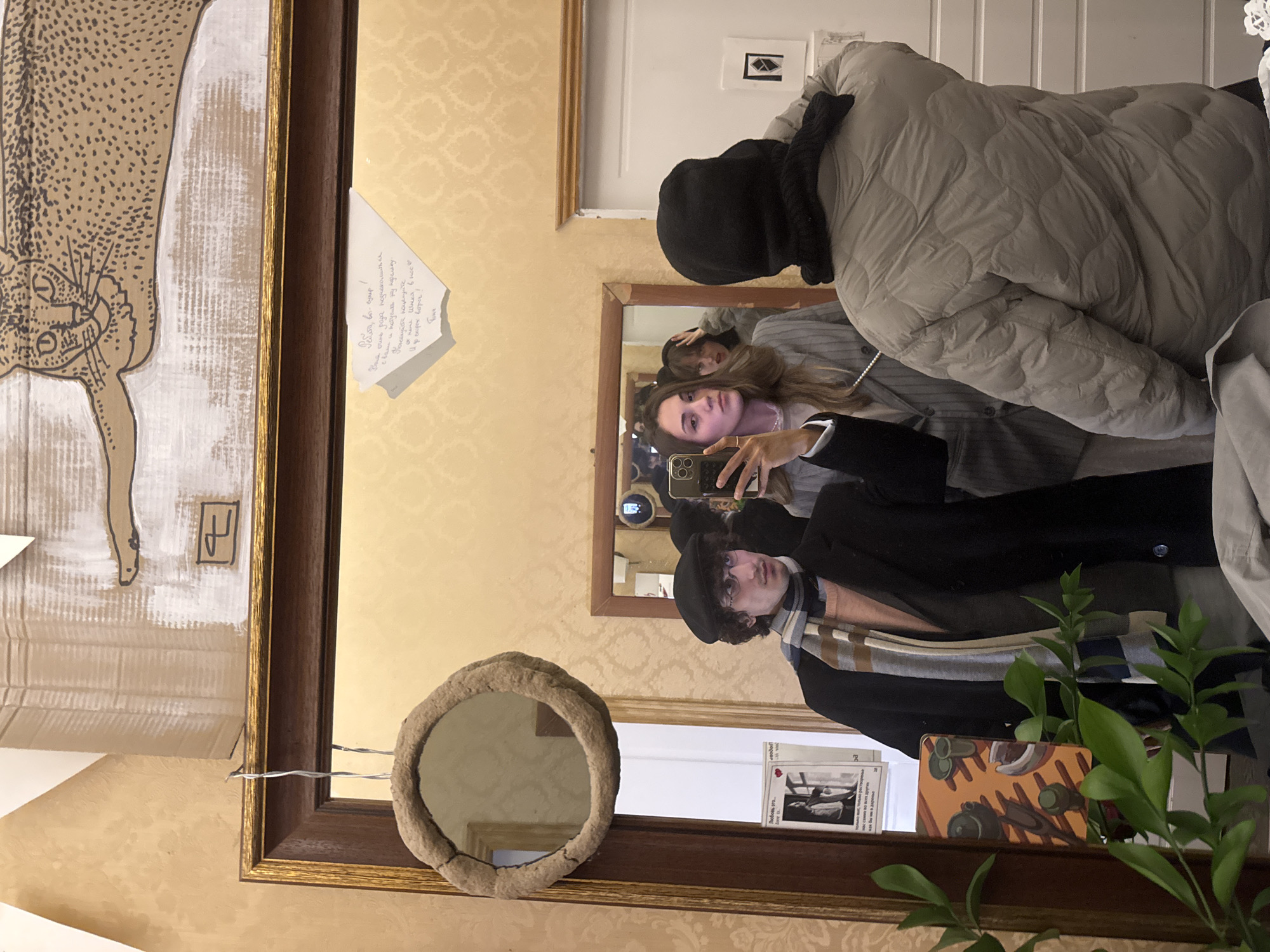 Person Takes Selfie at Decorated Mirror in Moscow
