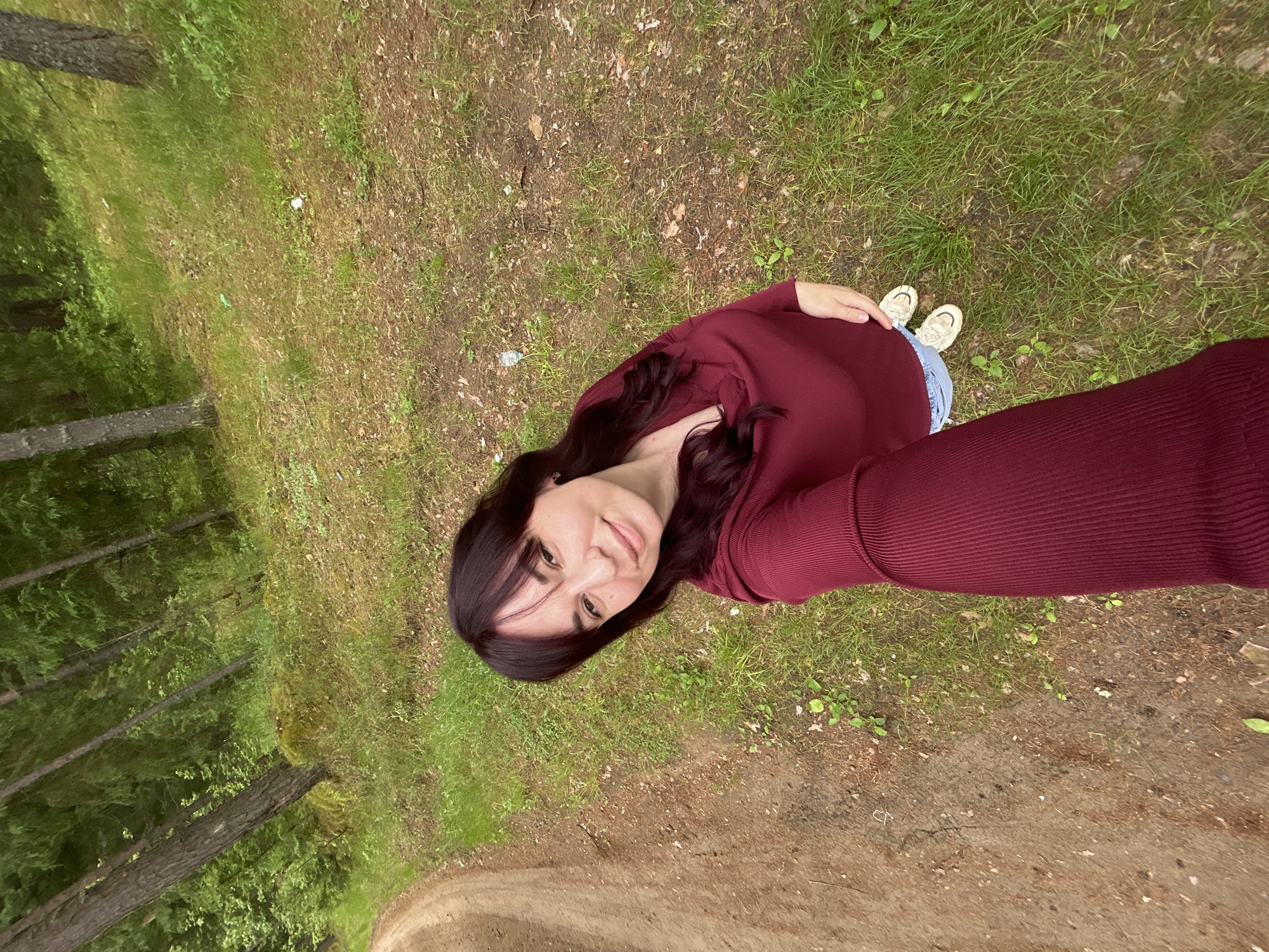 Woman takes forest selfies in Chaykovsky, Russia