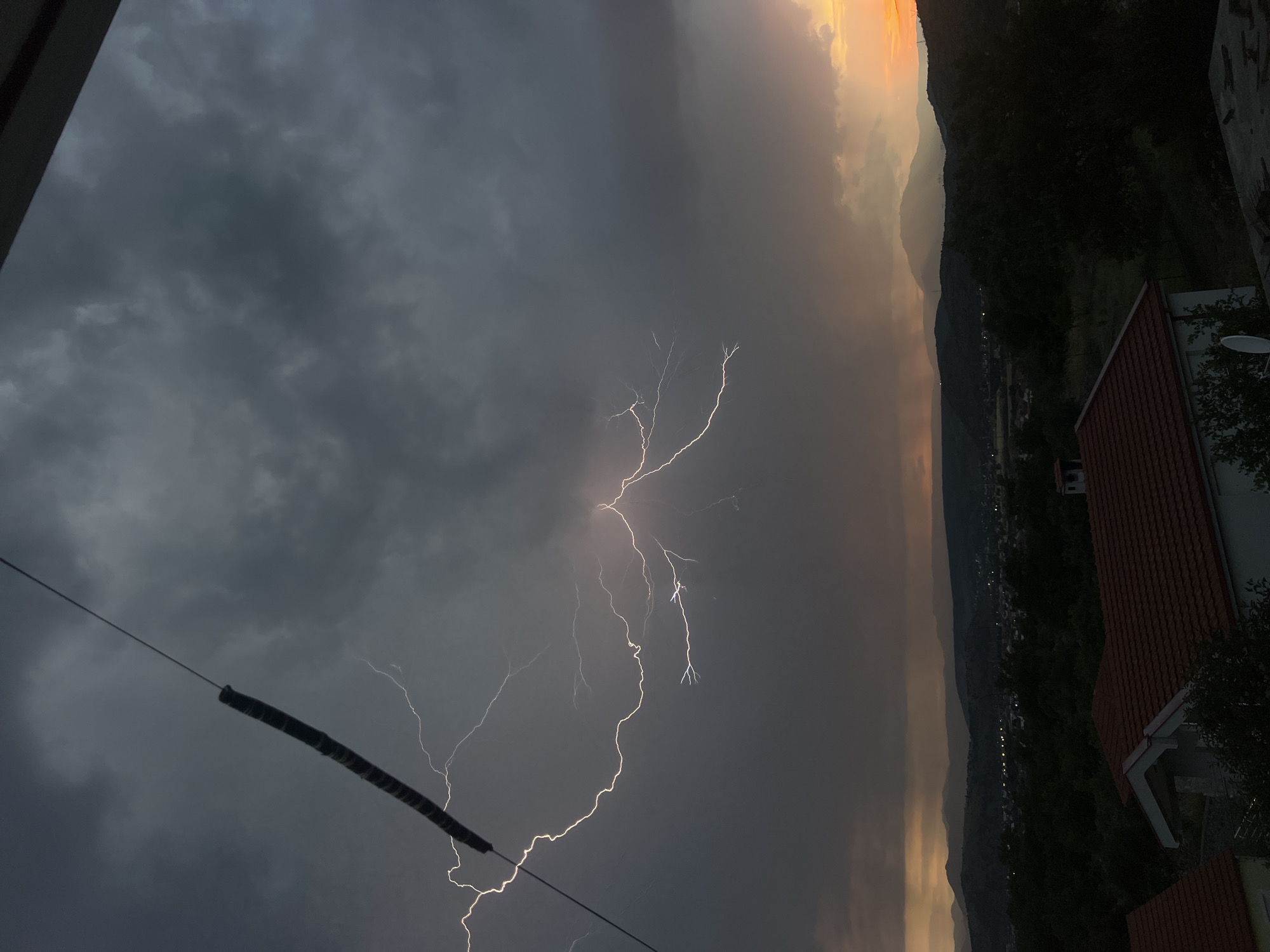 Stormy skies and quiet streets in Podgorica at dusk
