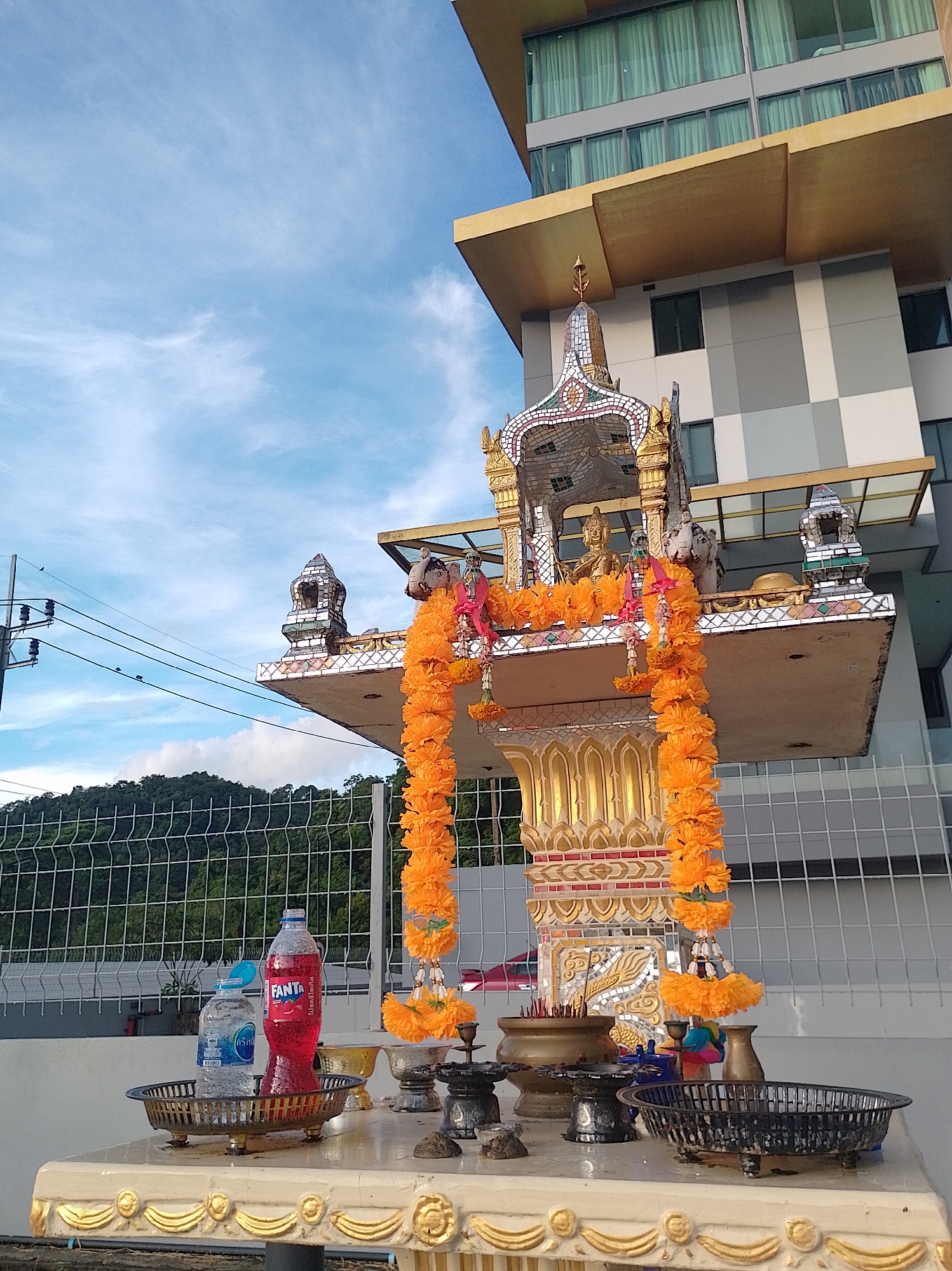 Spirit houses and twilight color Phuket City at dusk