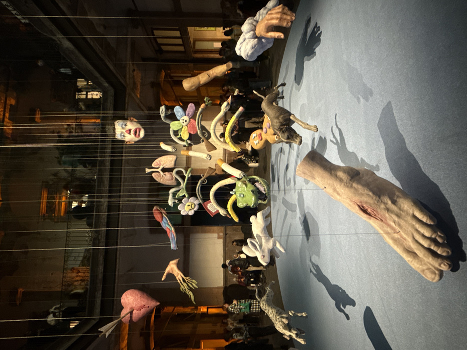 Art gallery visitors fist bump at Mexico City installation