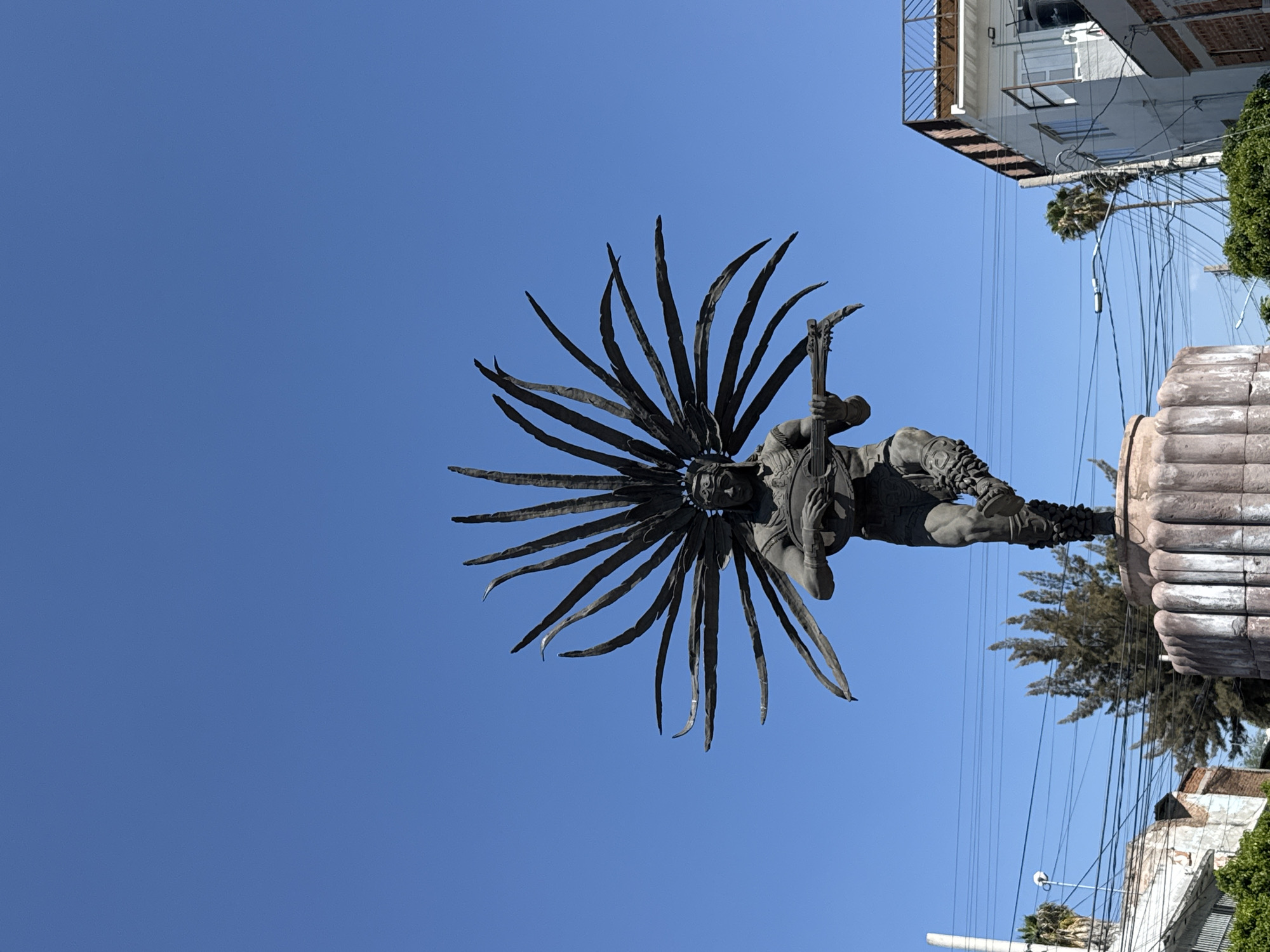 Indigenous musician statue observed in Querétaro, Mexico