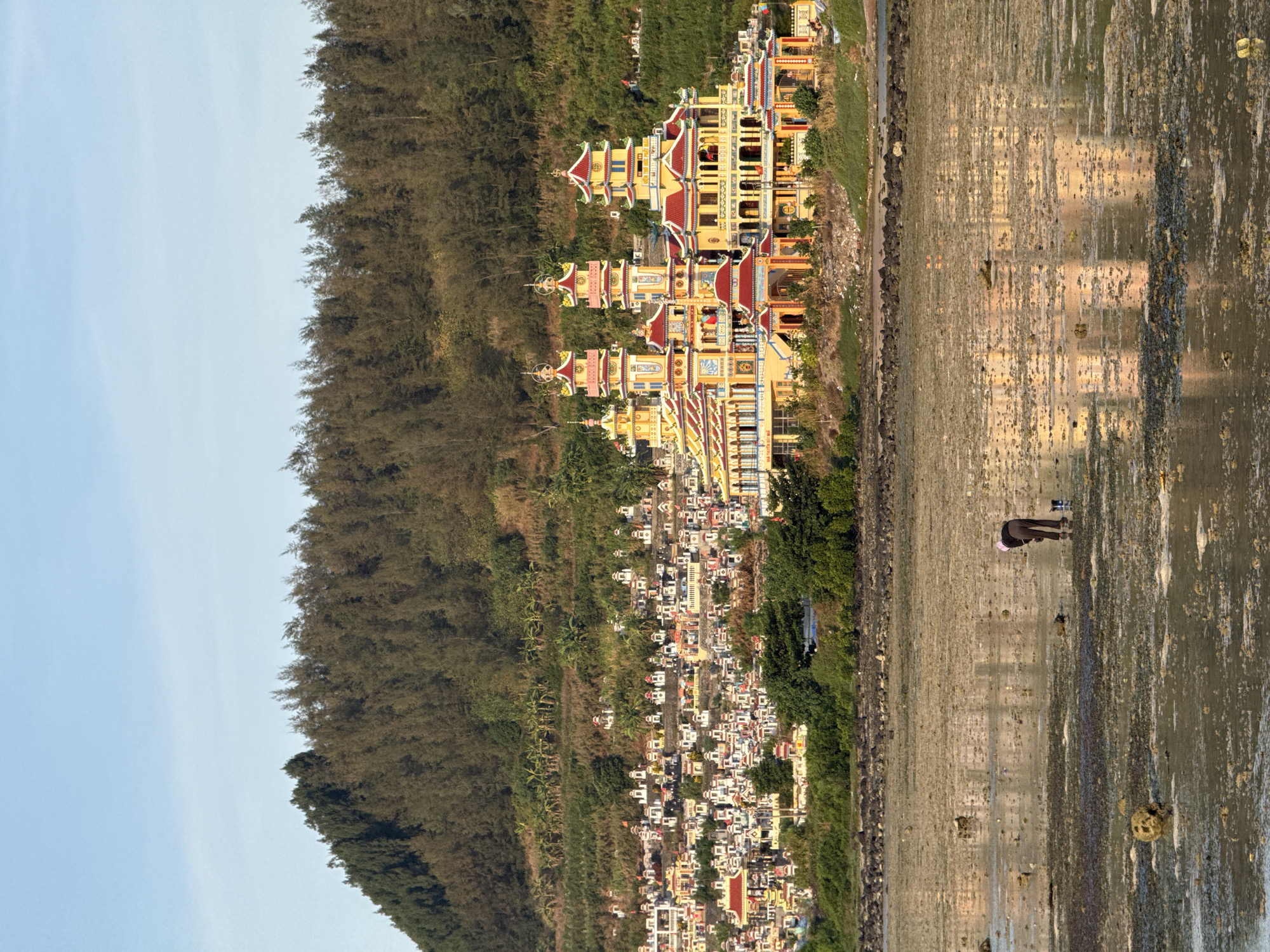 Hillside Buddhist temple overlooks tidal flats on Lý Sơn Island