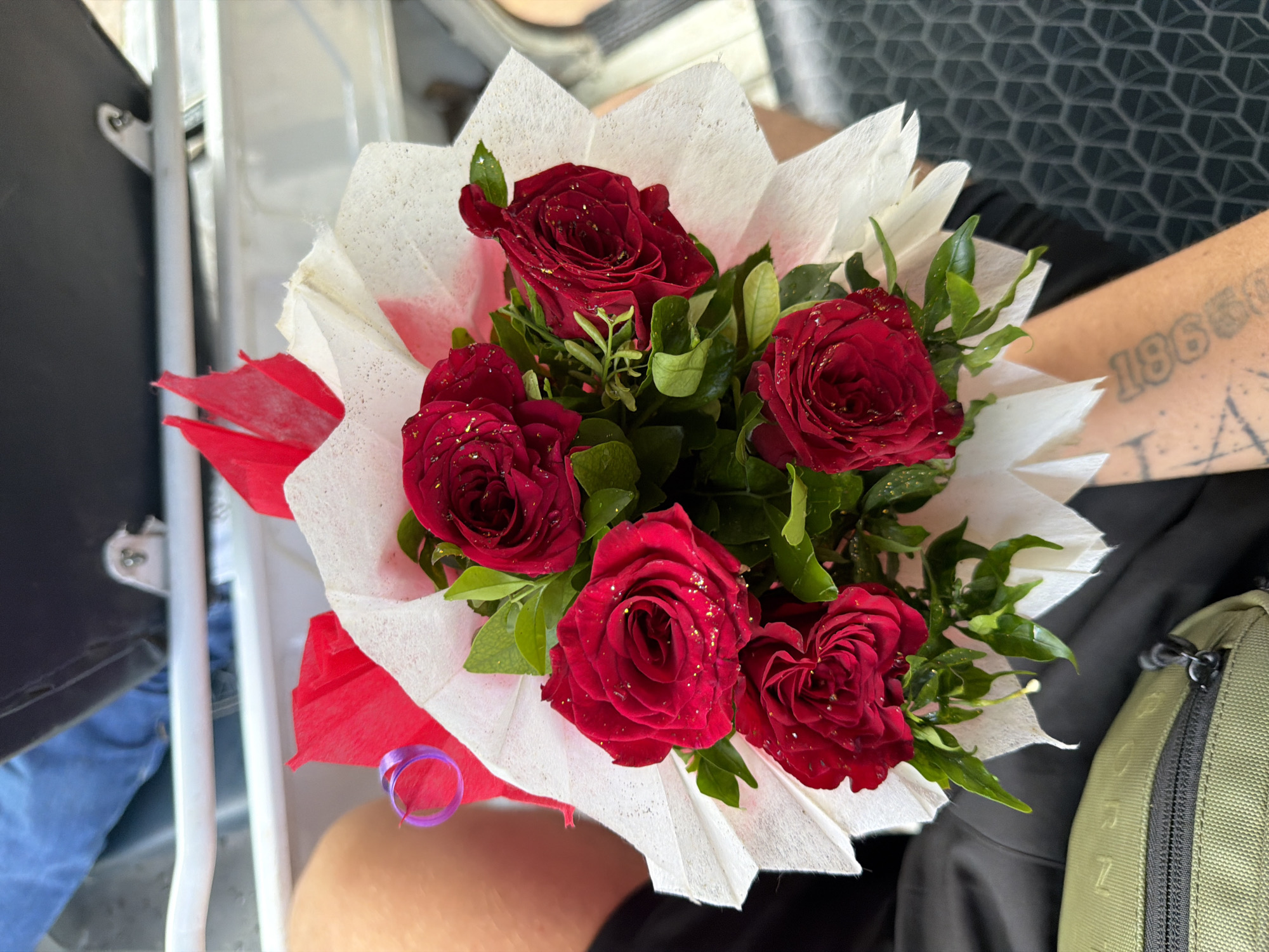 Red rose bouquet held up in Kanpur, July 2026