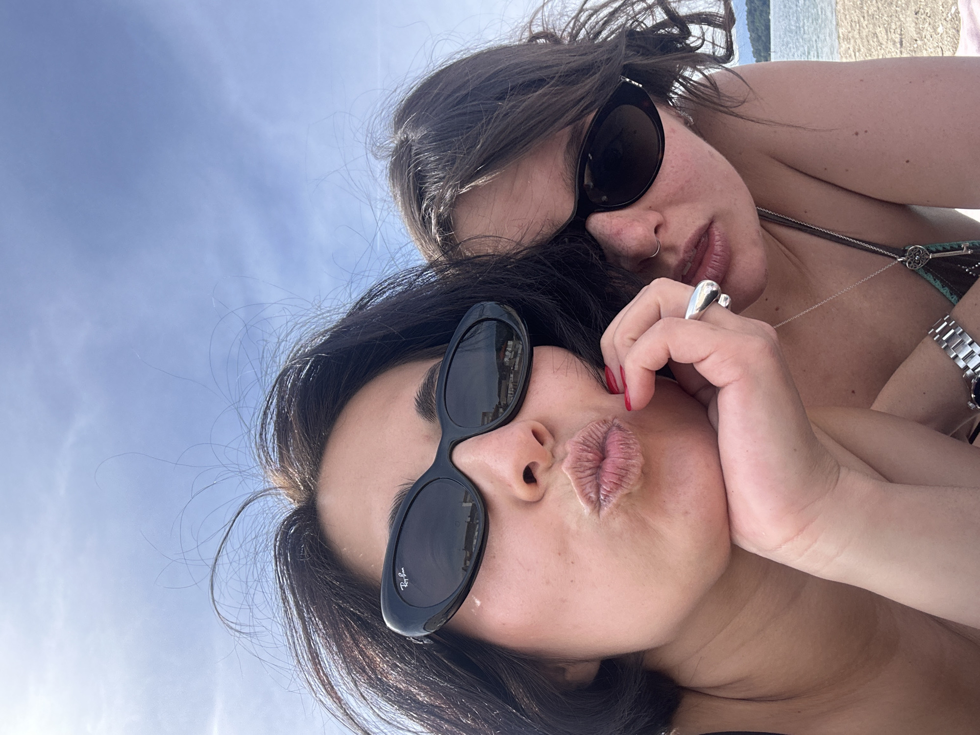Two women take sunny selfie at Vilagarcía waterfront