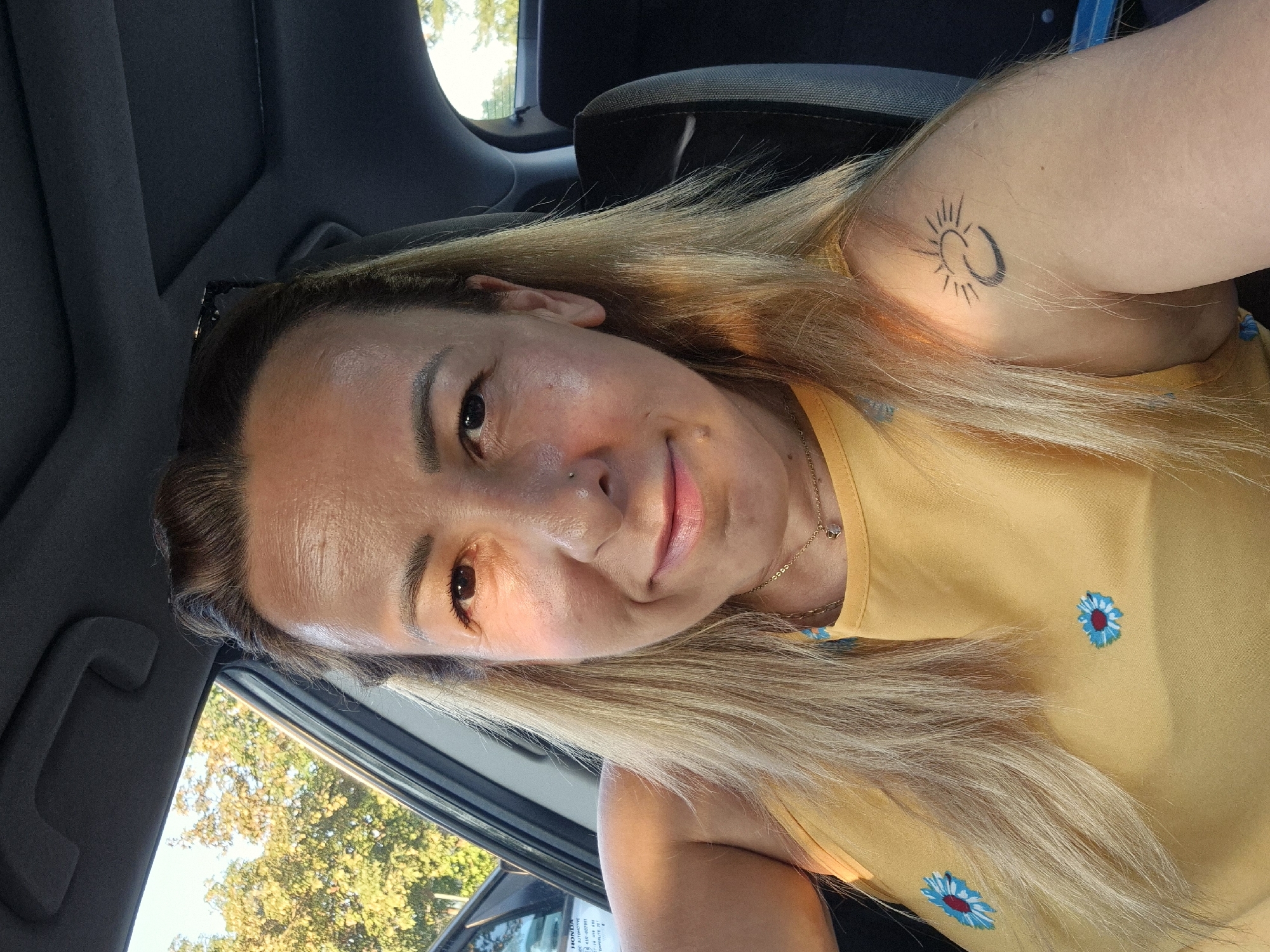 Selfie series from the driver's seat, sunny day.