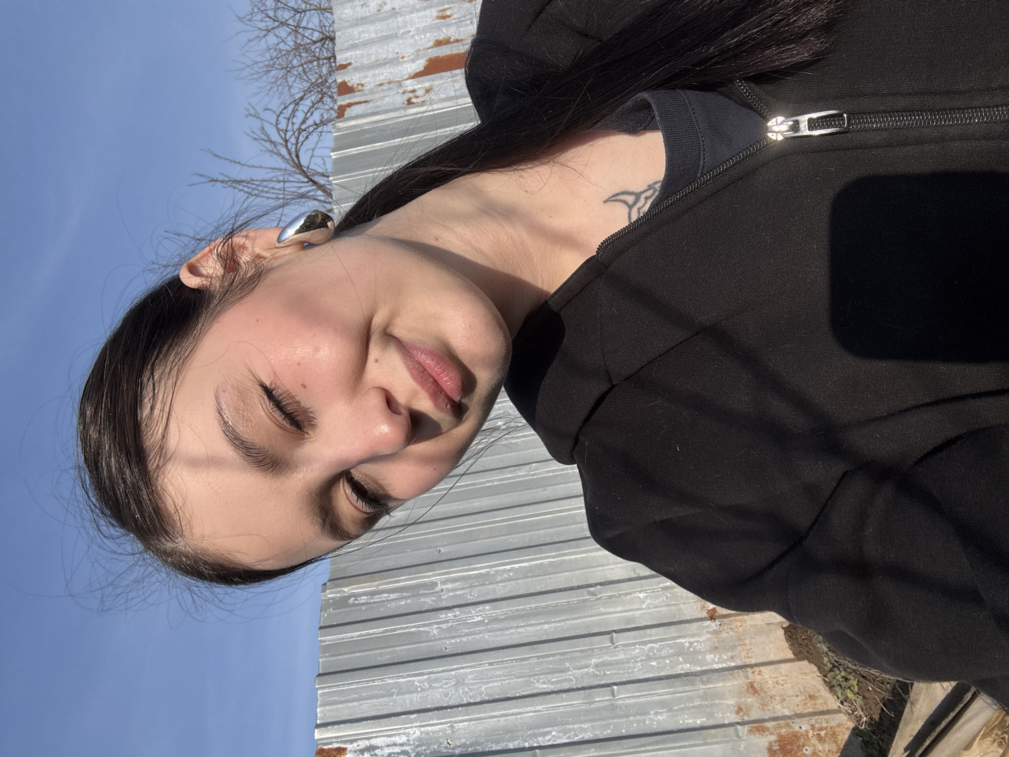 Woman and gray cat spotted in Foki, Russia yard