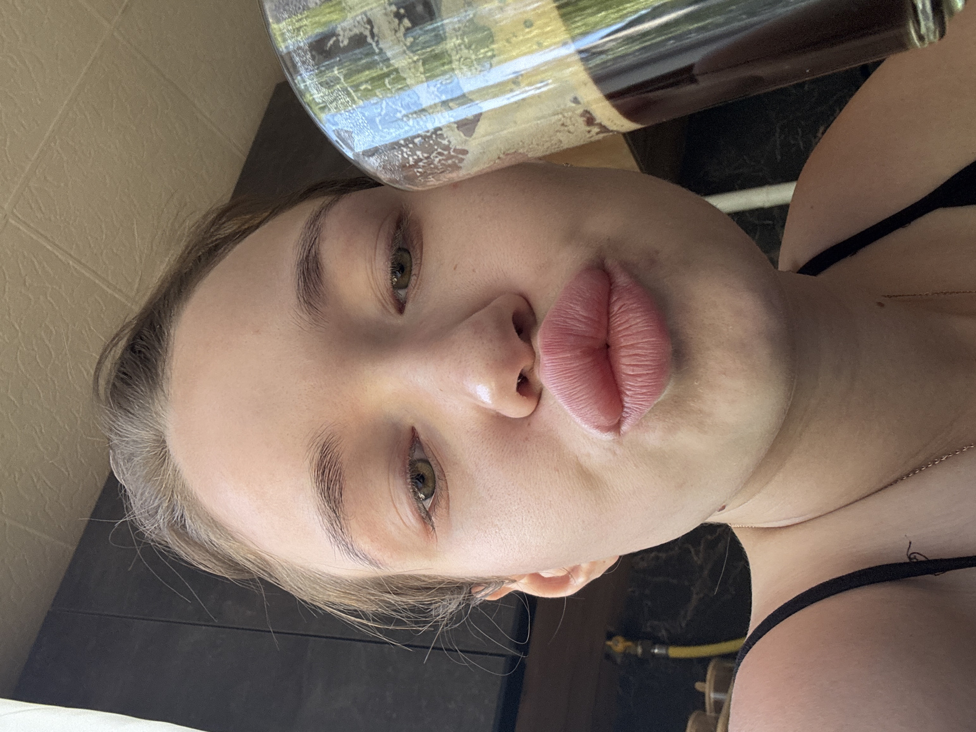 Woman documents morning routine in Chaikovsky kitchen