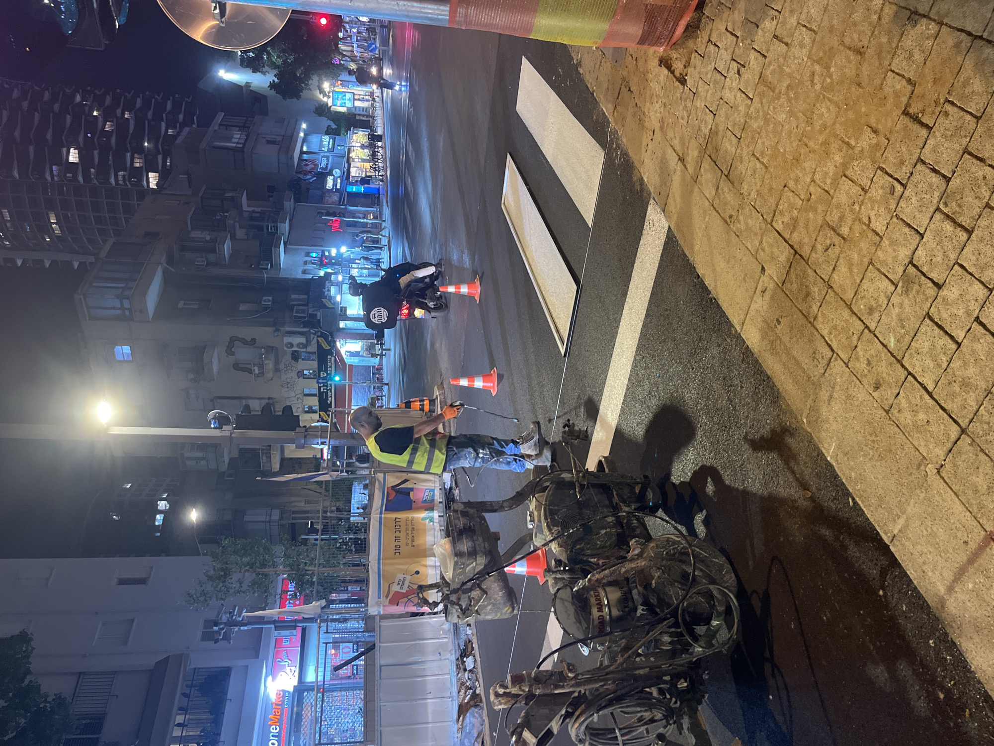 Road-marking equipment spotted on Tel Aviv street at night