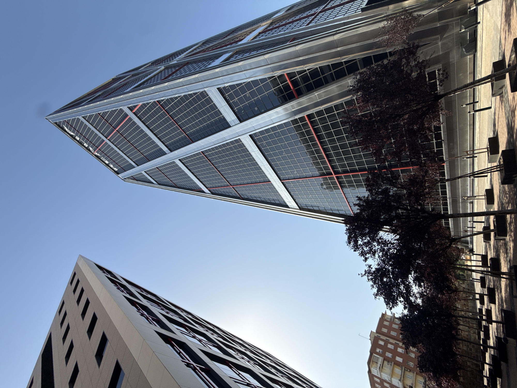 Madrid's landmark business district towers on a clear morning