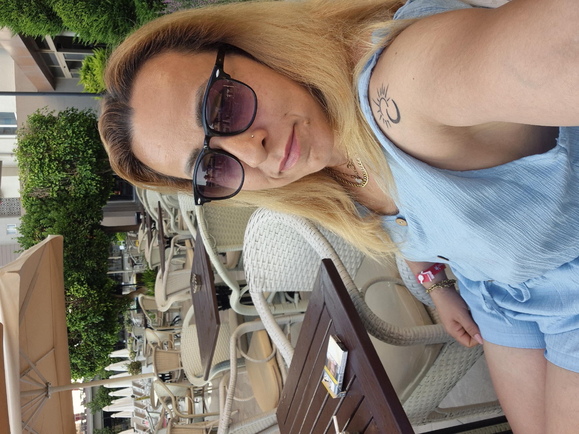 Chilling at a resort garden with coffee on a sunny day