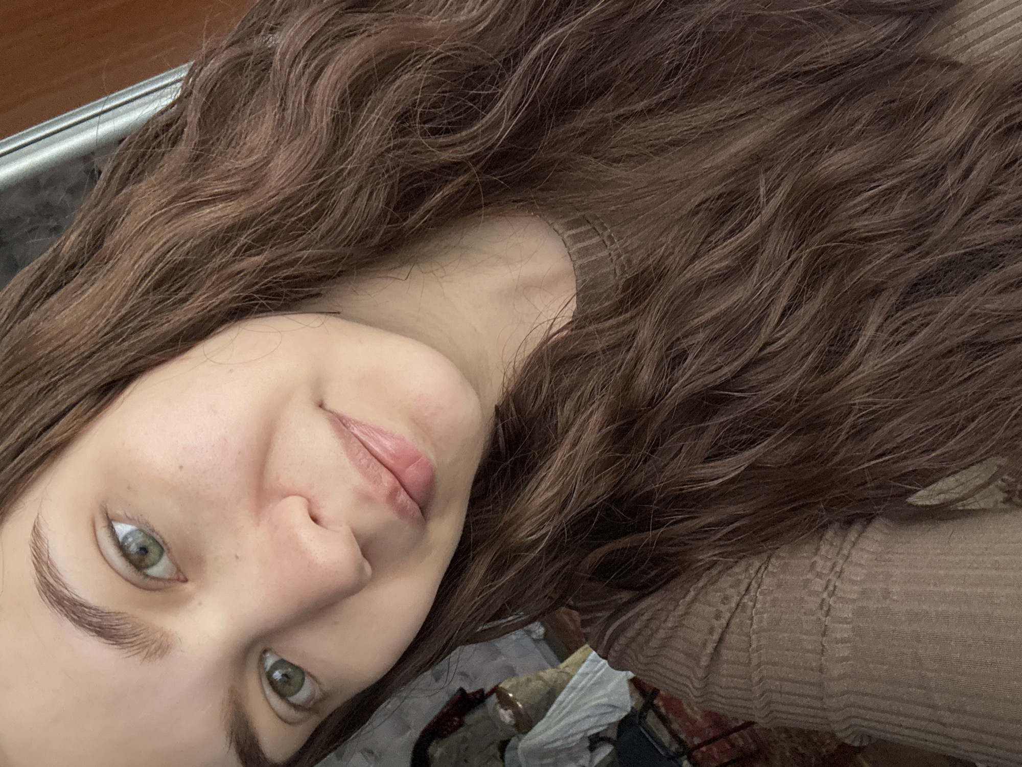Woman takes morning selfies in Russian village home