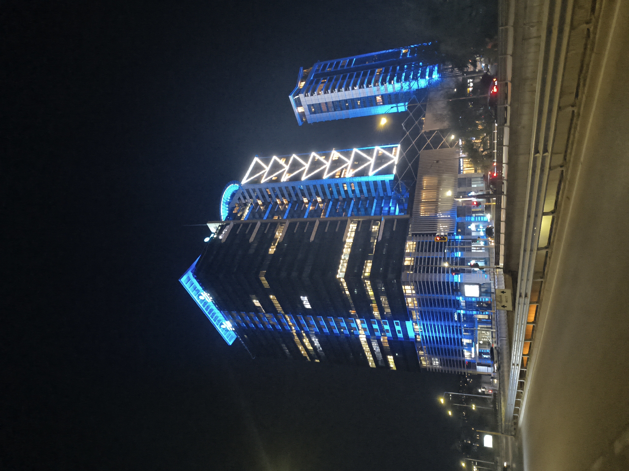 Capital Fort buildings illuminated blue and white in Sofia