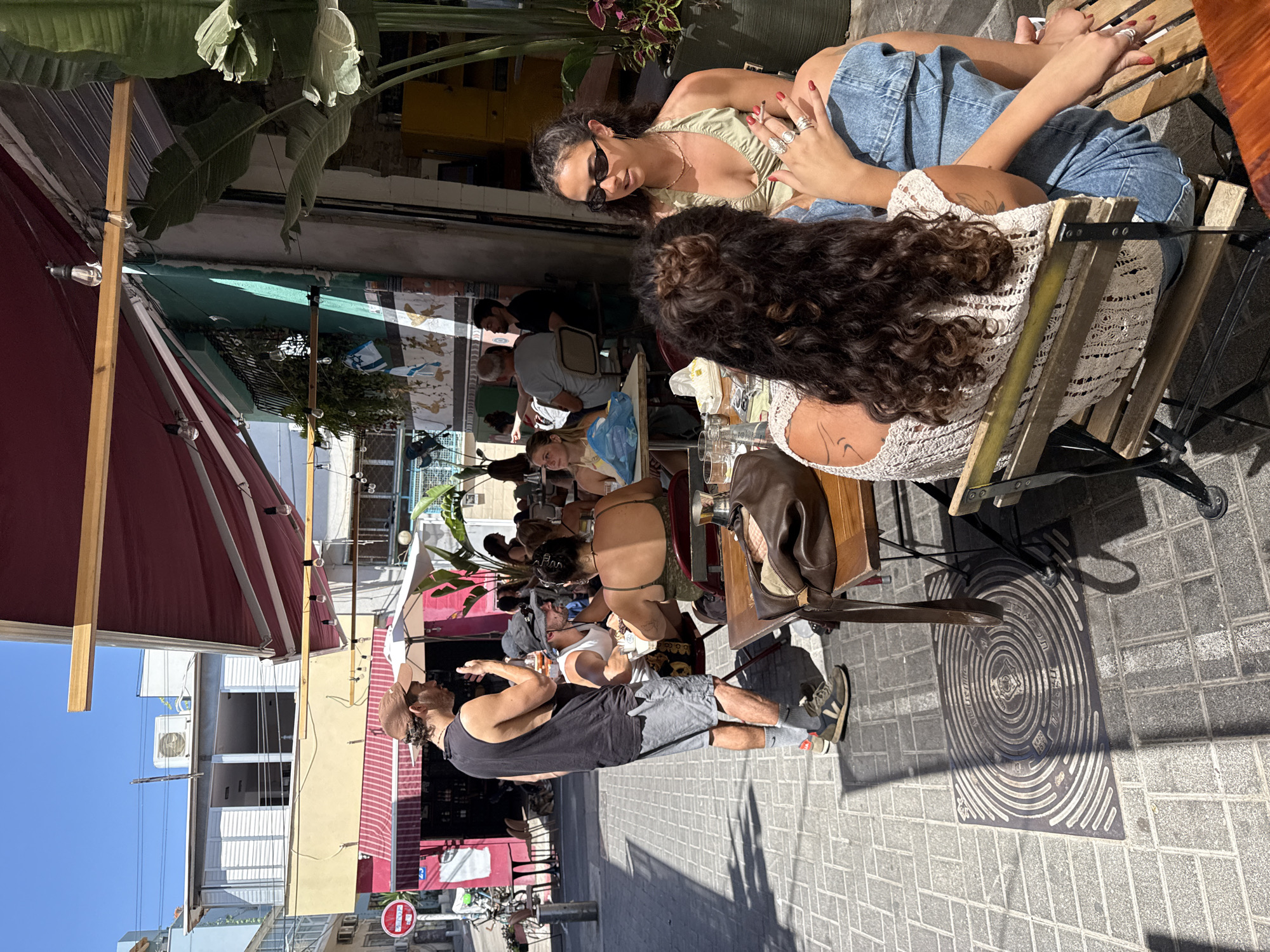 Morning market browsing and cafe scenes in Tel Aviv