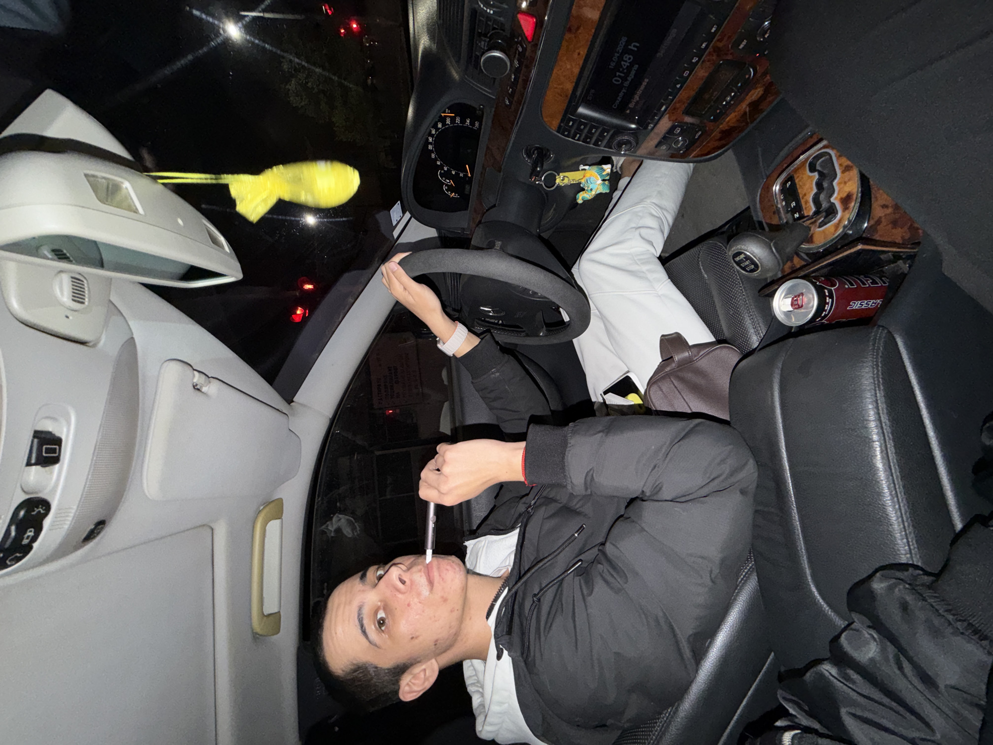 Young man vapes in car in Plovdiv, Bulgaria