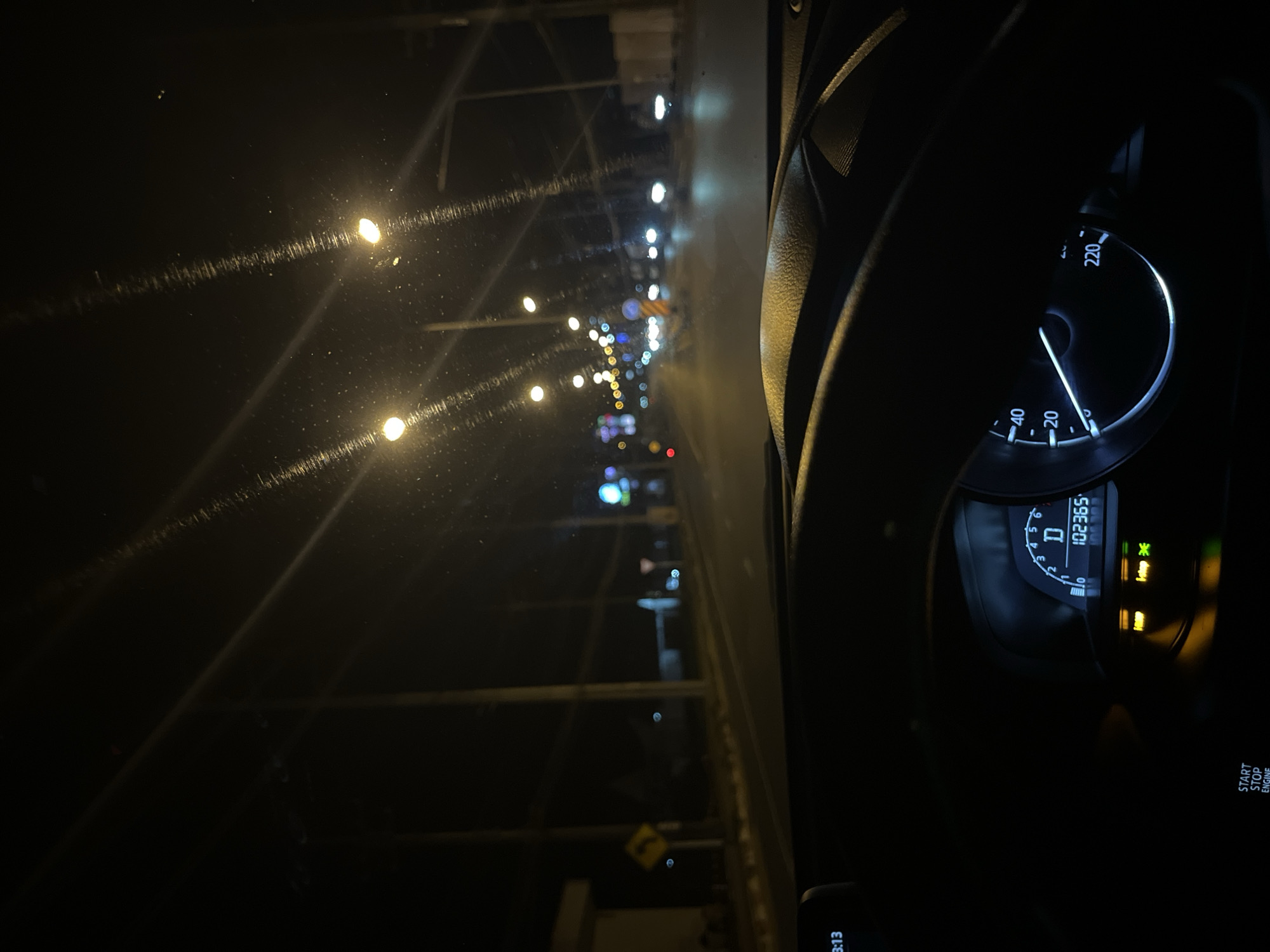 Night drive through illuminated Chalong streets captures local signage