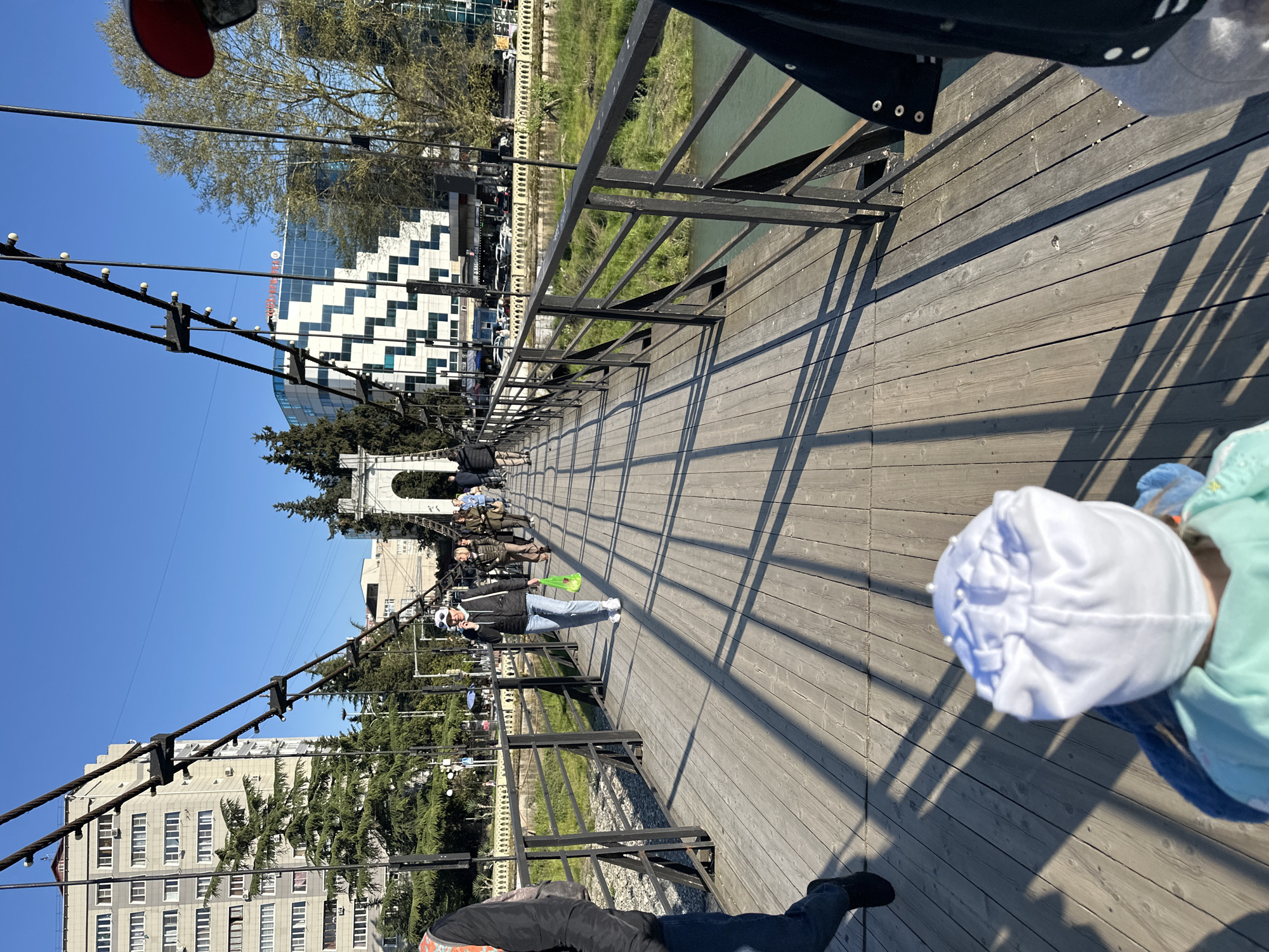 Family enjoys sunny afternoon outing in Sochi parks and playgrounds