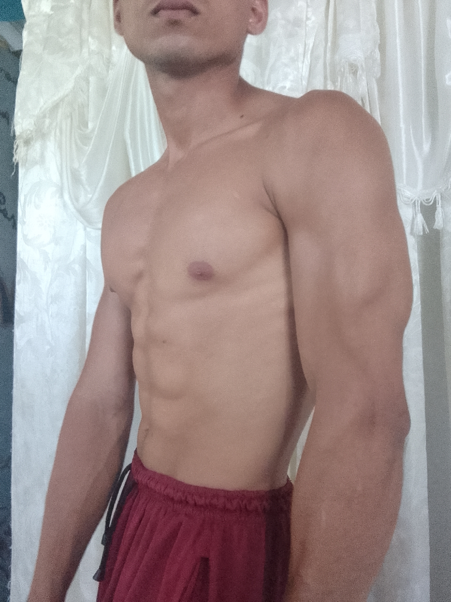 Man poses for indoor fitness photos in Venezuela