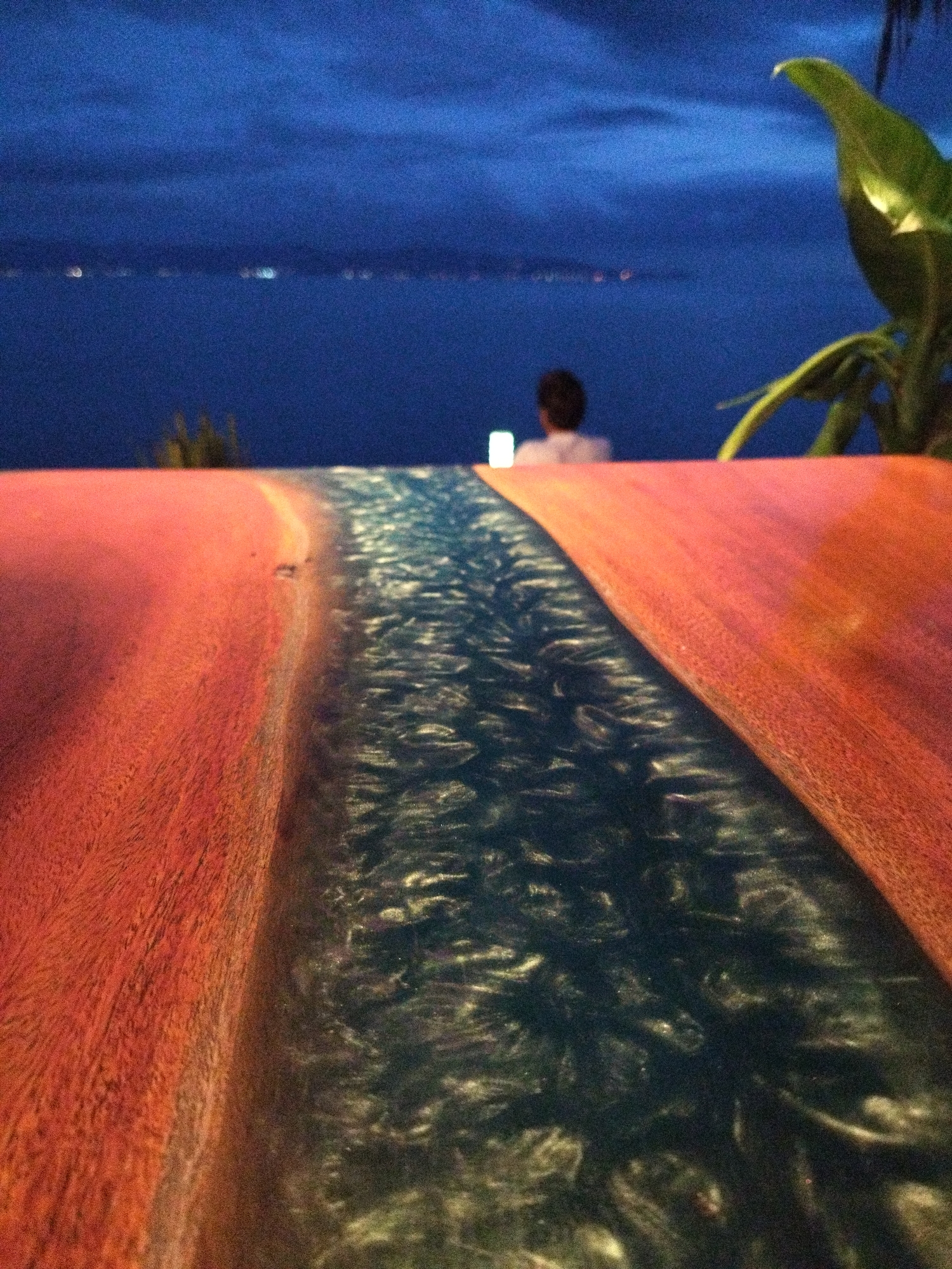 Nighttime waterfront dining captured in Ban Tai Subdistrict, Thailand