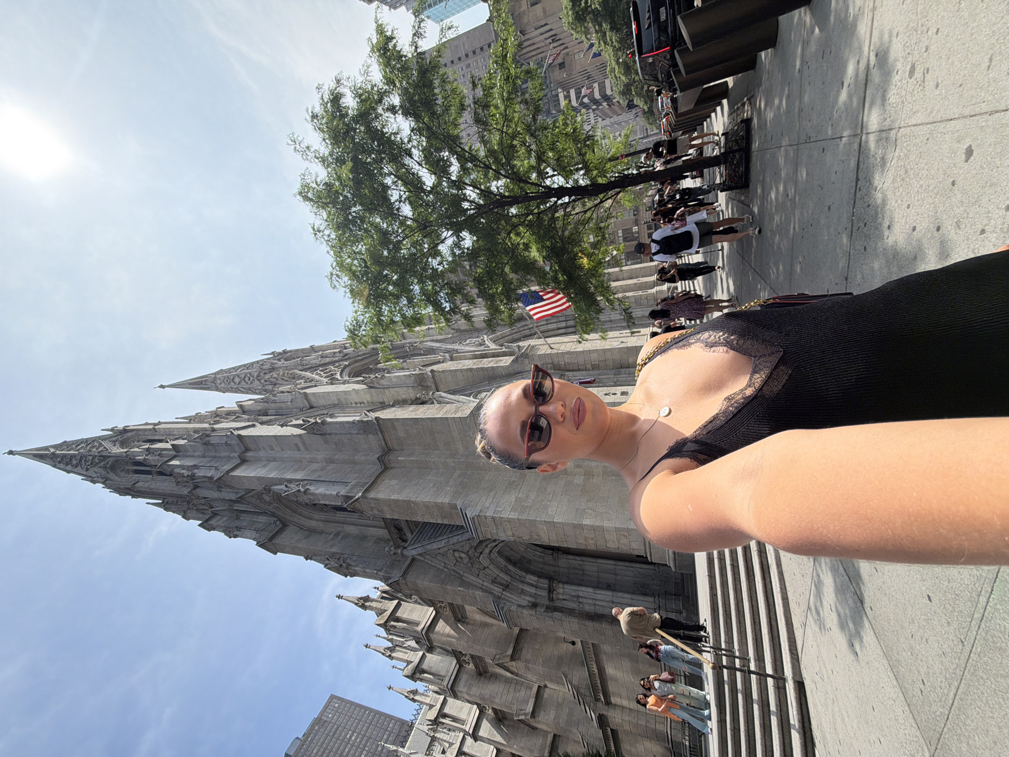 Tourist shops, takes selfie at St. Patrick's Cathedral