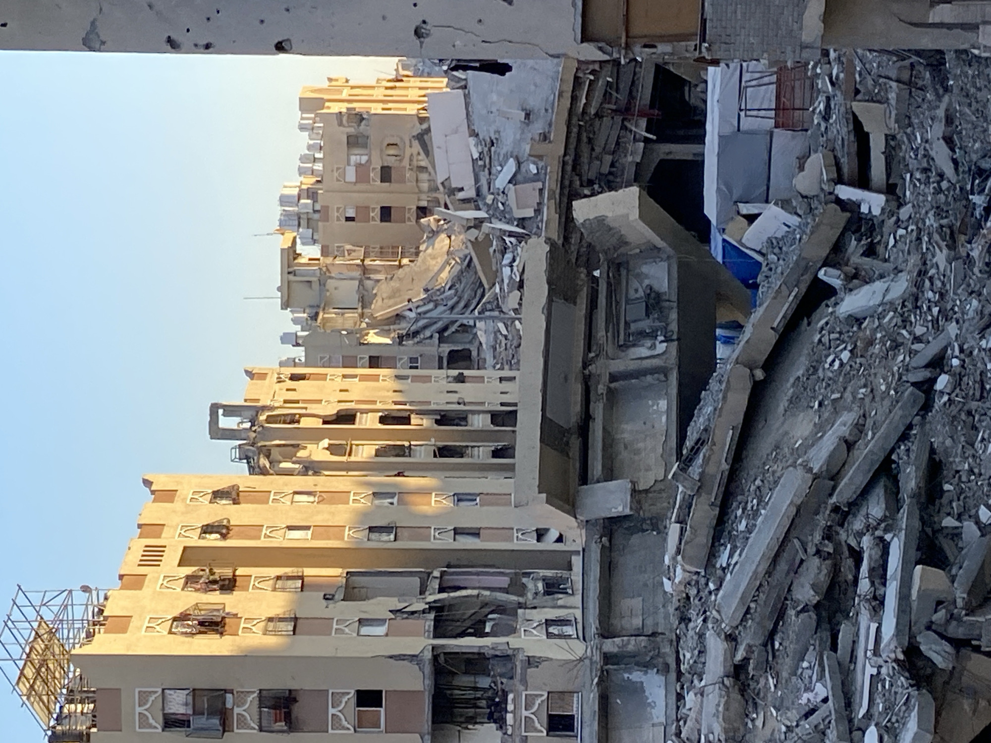 Witness documents damaged buildings, shelters in Khan Yunis