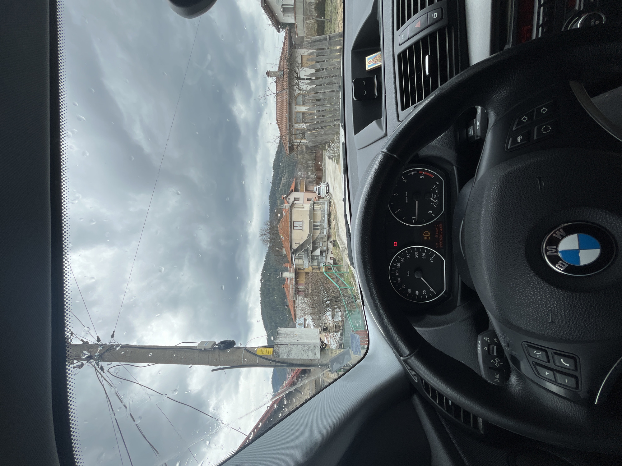 Overcast weather observed from BMW interior in Chepelare, Bulgaria