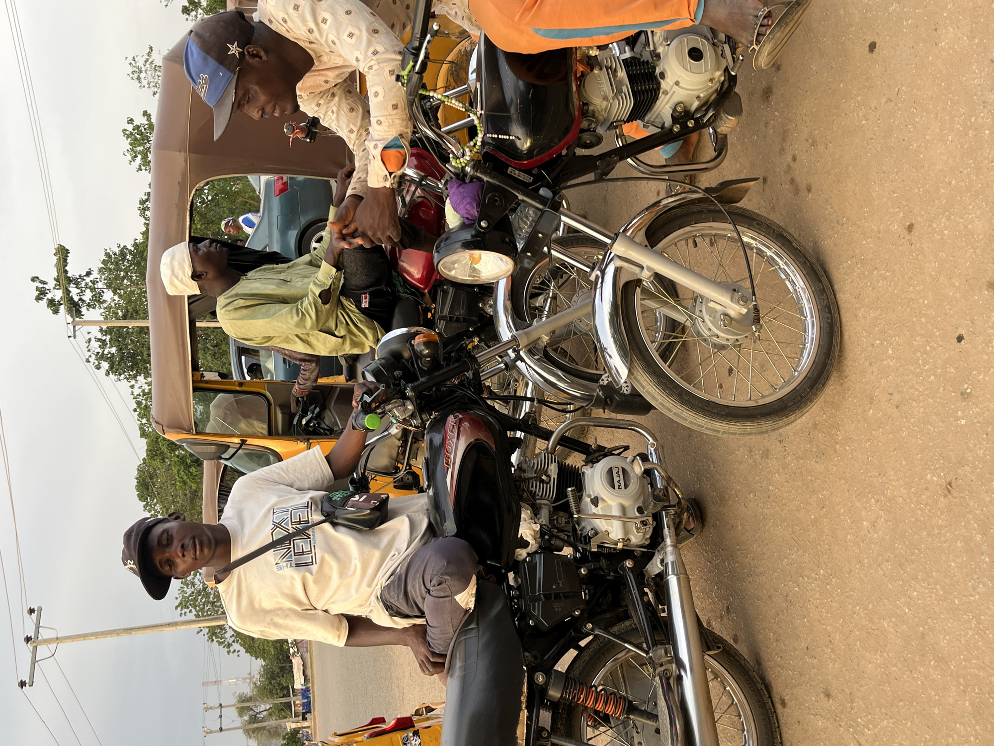 Daily street life documented across Abuja neighborhoods during evening hours
