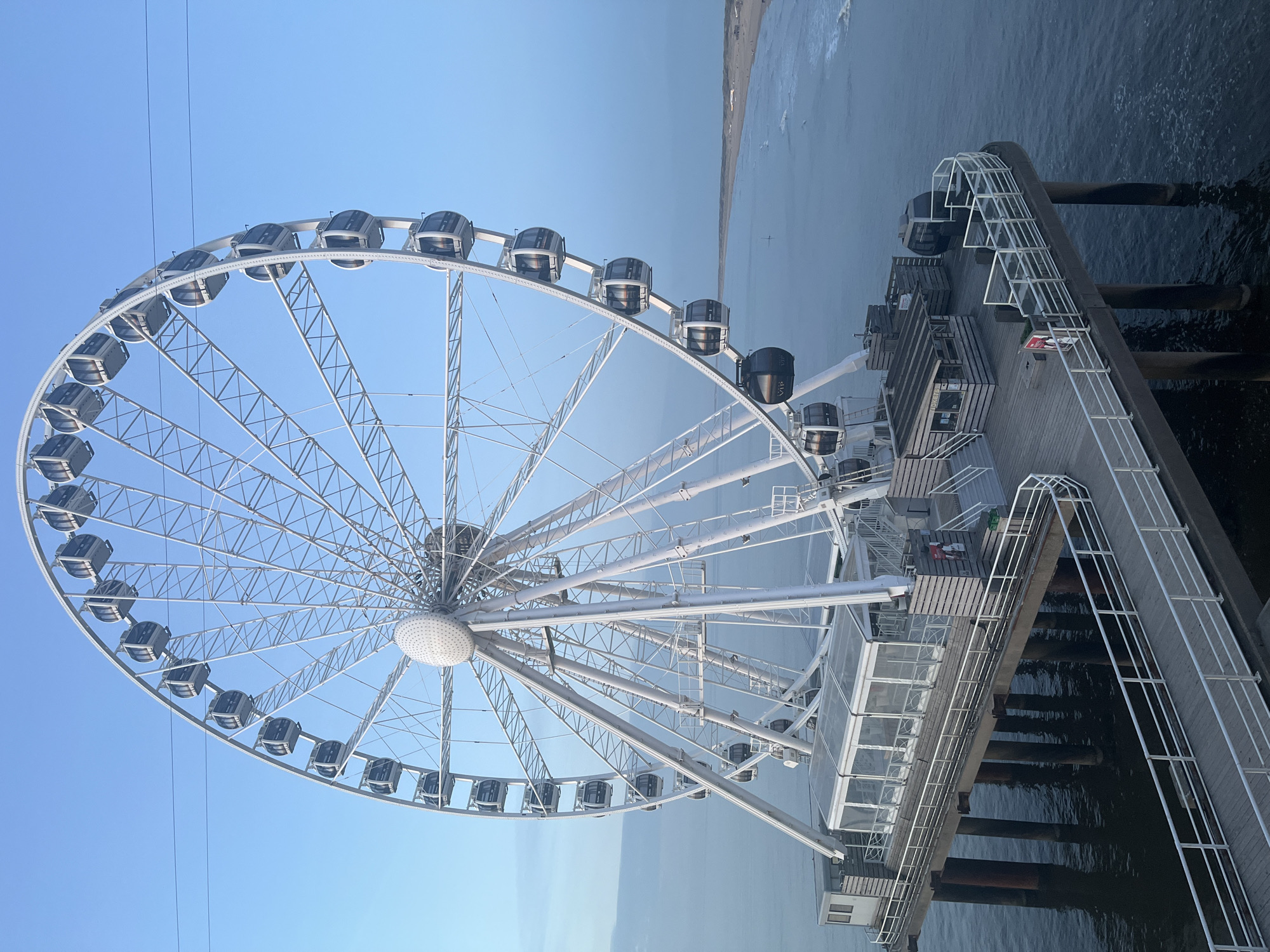 Sunset beach scenes with art installation in The Hague