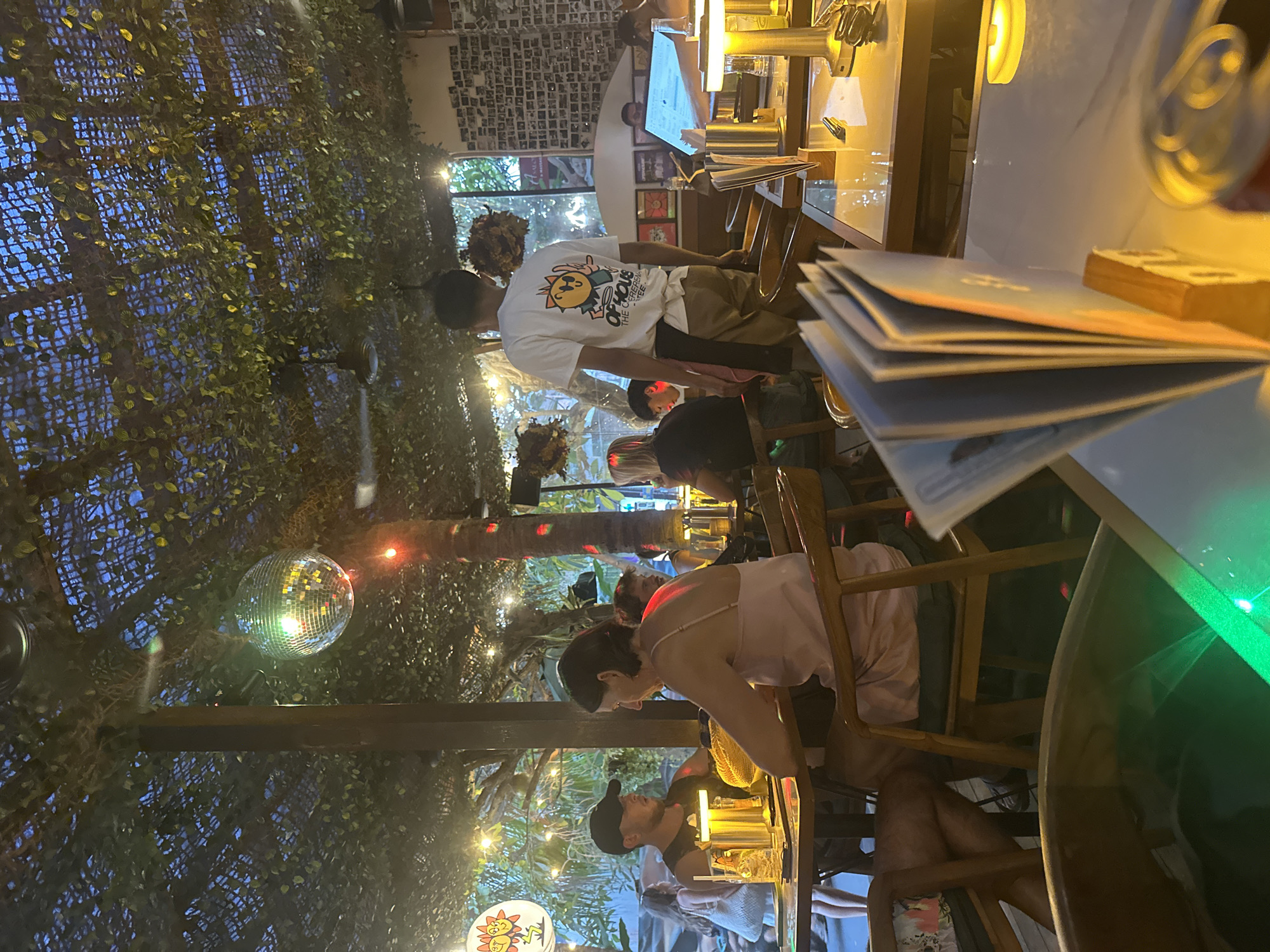Burgers, fries, and cheesecake at a Mengwi restaurant