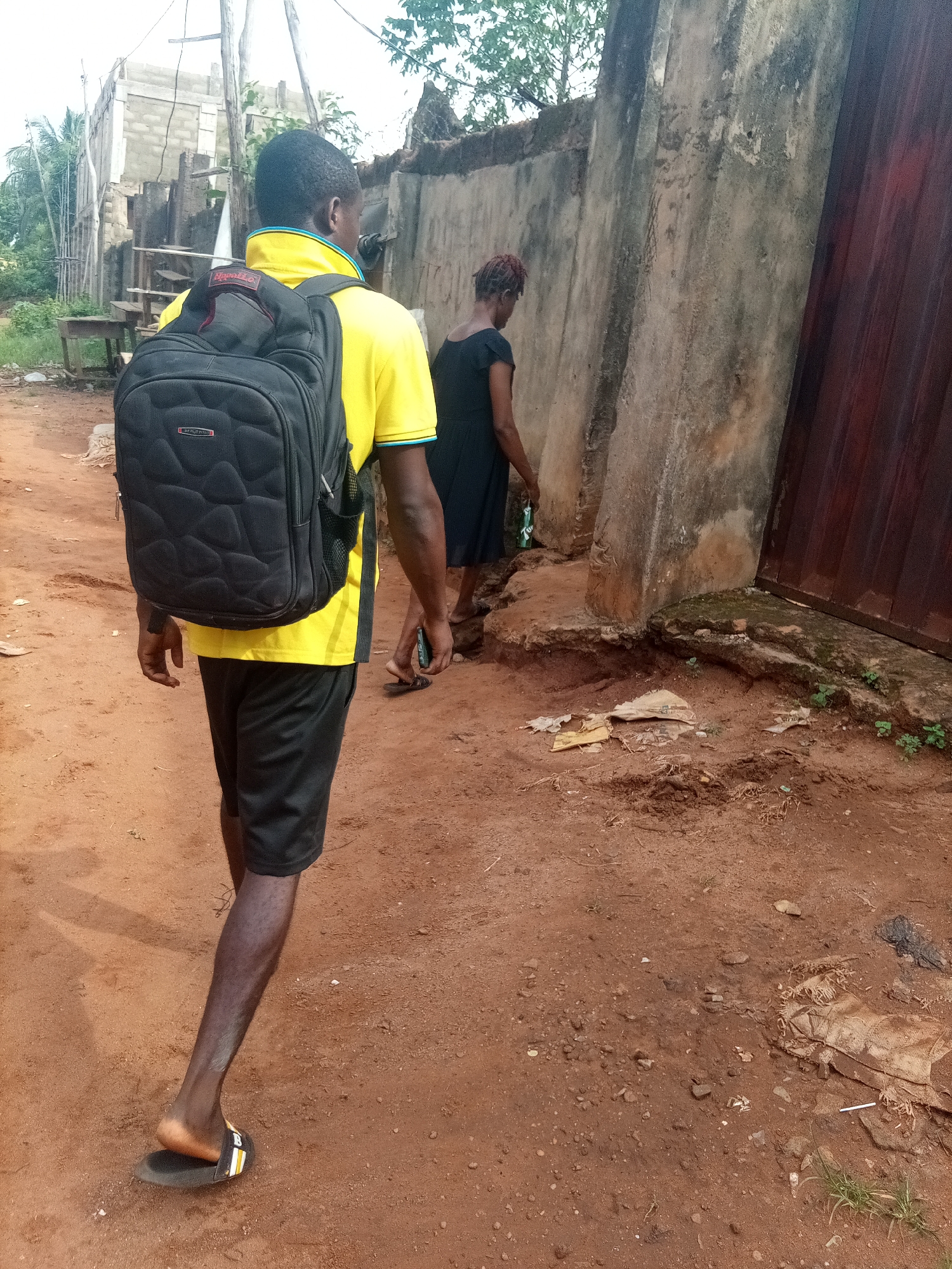 Morning life documented in Nigerian communities: tailors, pedestrians, deliveries