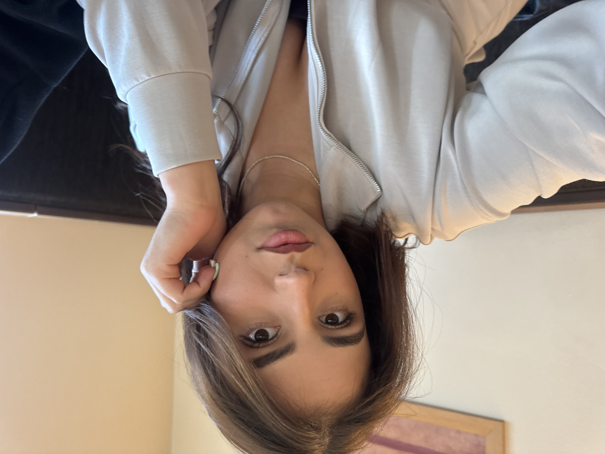 Woman takes bathroom selfies in Sofia restroom