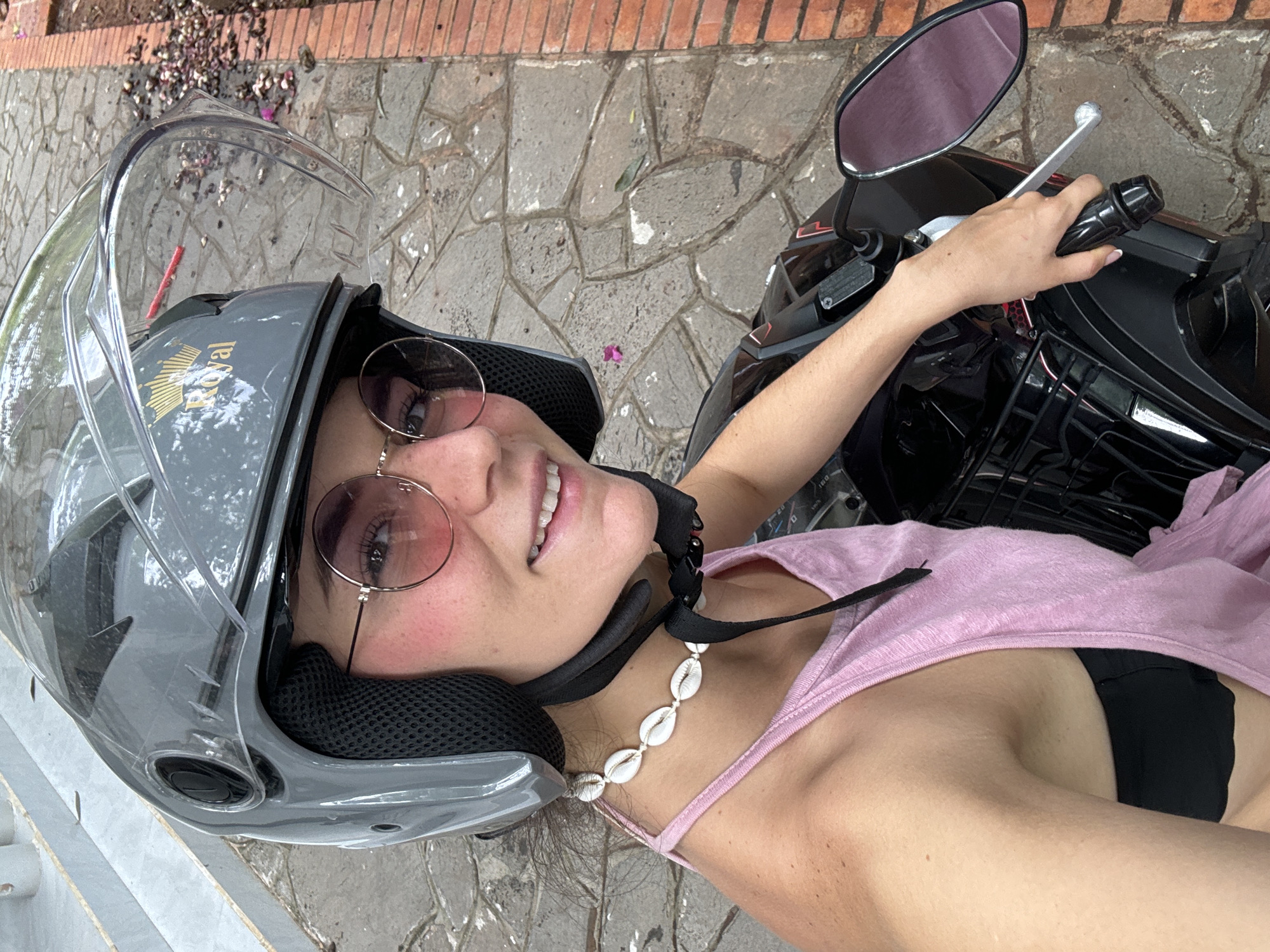 Young woman photographed in various settings in Mũi Né