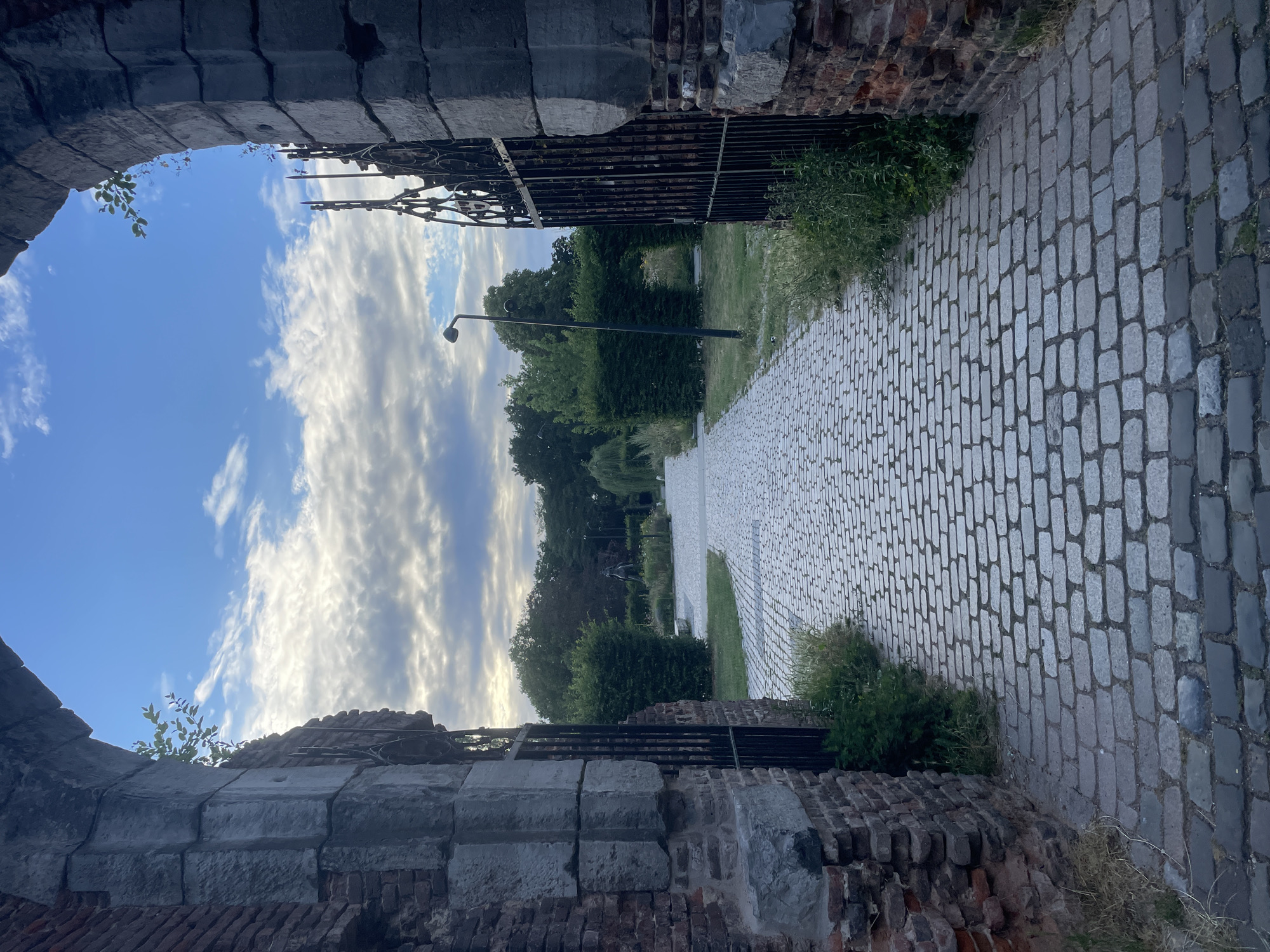 Historic pathways and a bronze equestrian statue in Weert