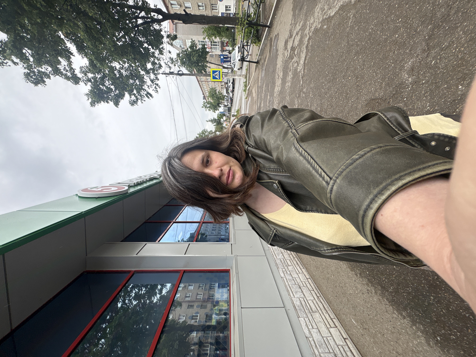 Morning selfies captured on overcast streets in Chaikovsky, Russia