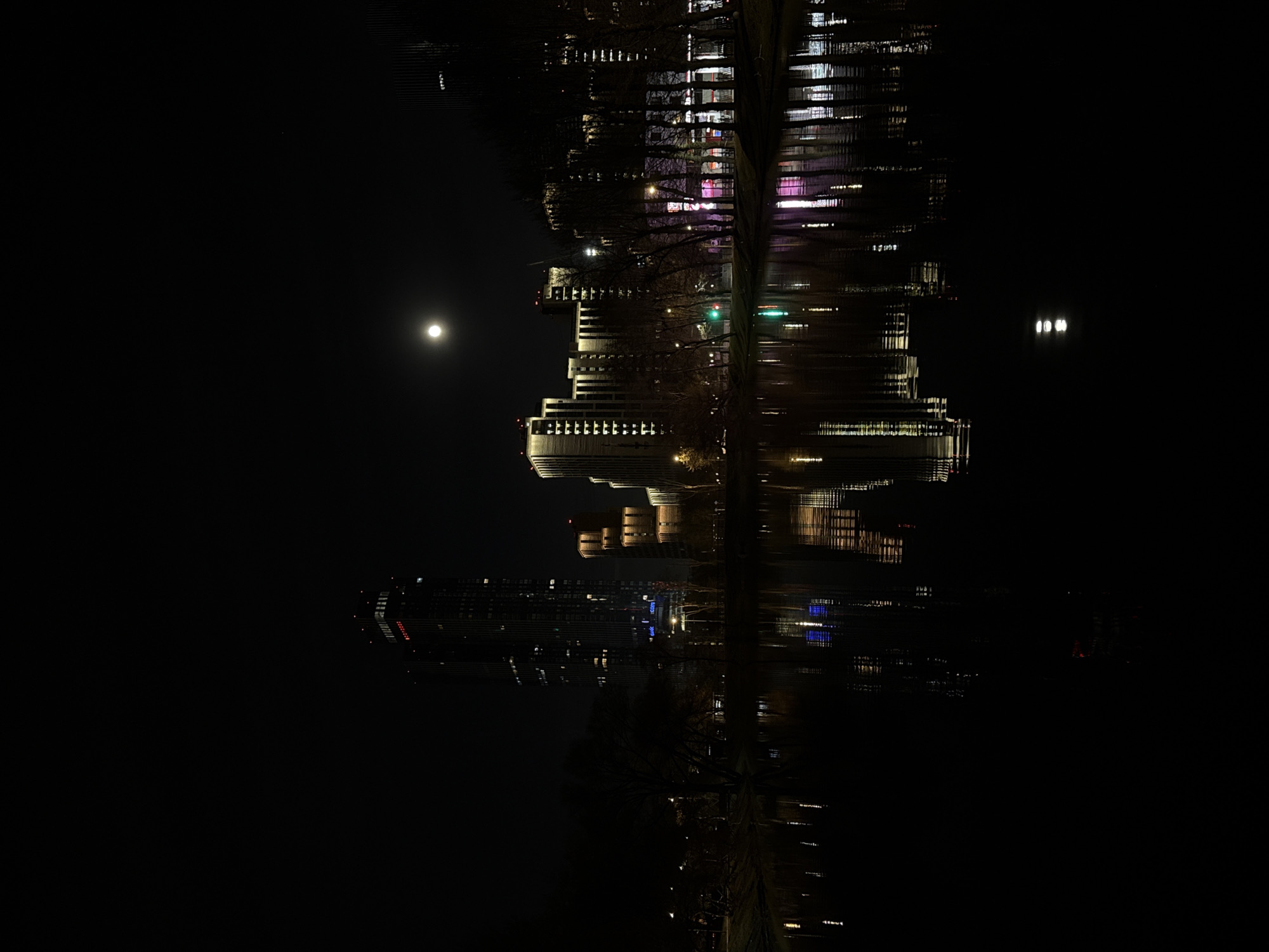 Moonlit building reflection captured in Khimki waters