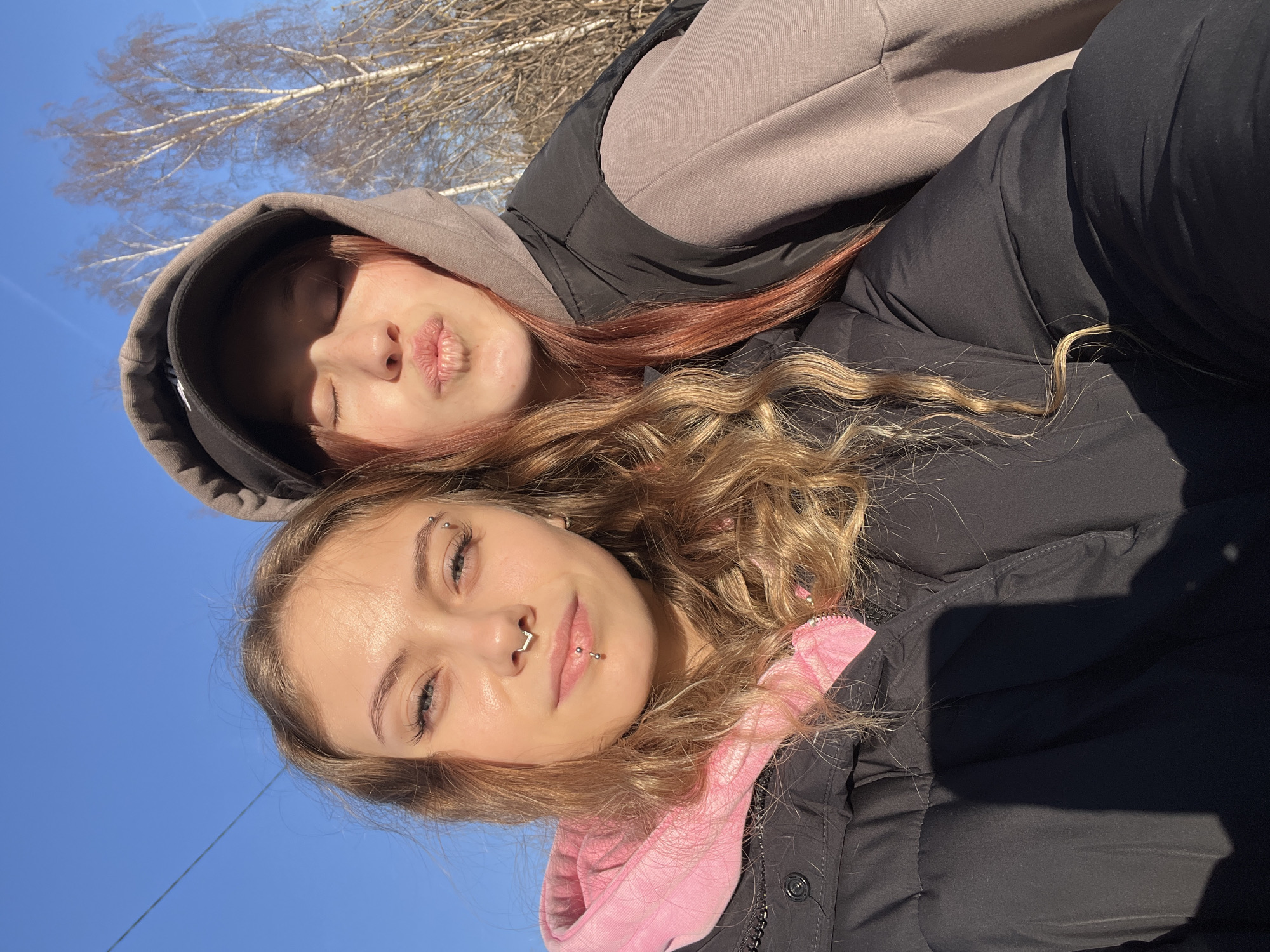 Young women take selfies in Фоки, Russia