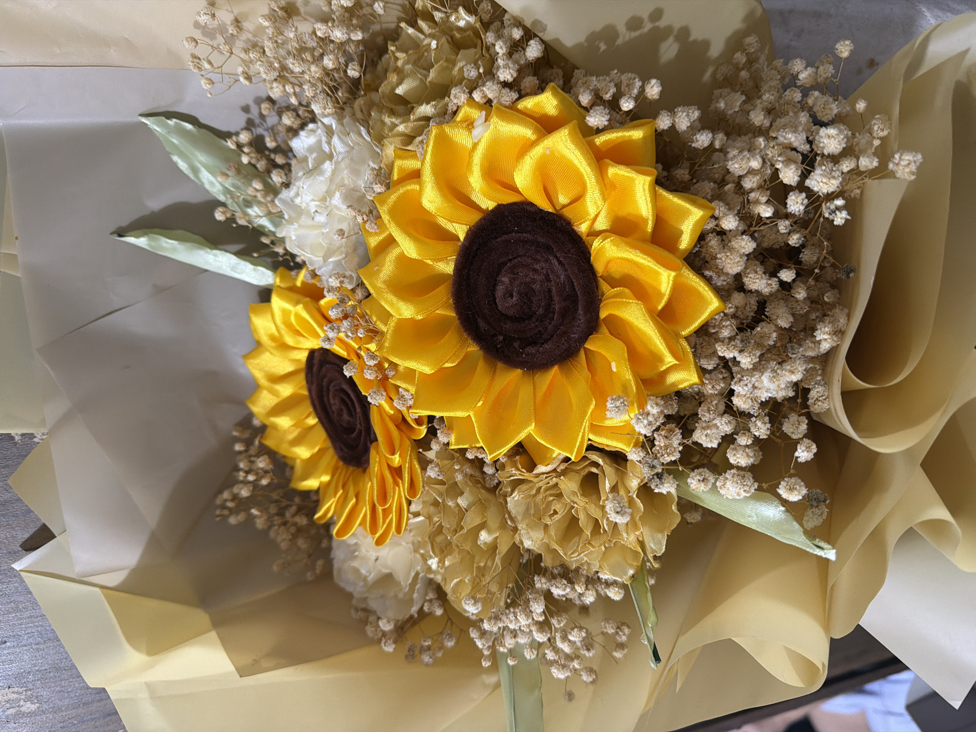 Birthday party spread with food, flowers, and cake in Davao City