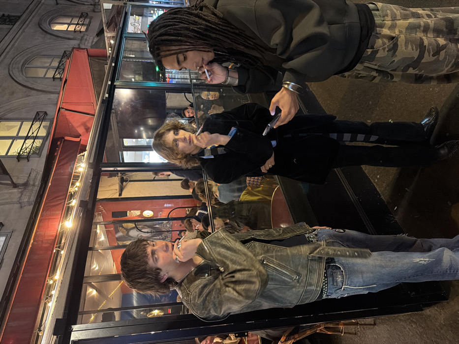 Nighttime gathering outside Paris restaurant captured by witness
